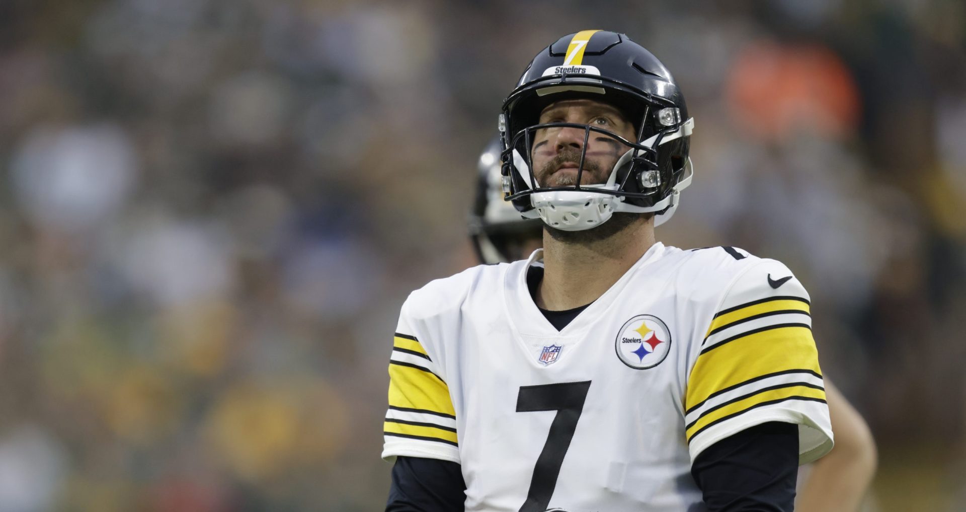 Pittsburgh Steelers' Ben Roethlisberger reacts as he walks off the field during the second half of an NFL football game against the Green Bay Packers Sunday, Oct. 3, 2021, in Green Bay, Wis.