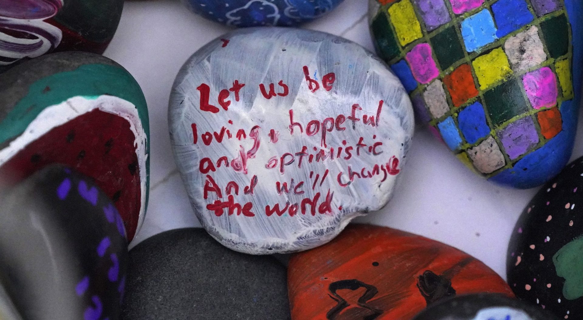 Stones are placed on a table following a Commemoration Ceremony in Schenley Park, in Pittsburgh's Oakland neighborhood, on Wednesday, Oct. 27, 2021. It has been three years since a gunman killed 11 worshippers at the Tree of Life Synagogue, in America's deadliest antisemitic attack.