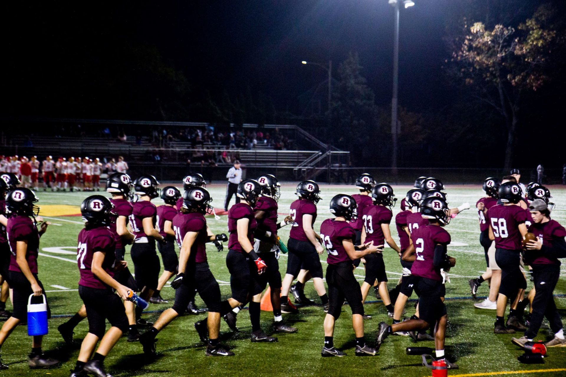 The Radnor High School football team takes the field on October 22, 2021. The school recently changed their mascot to the Raptors.