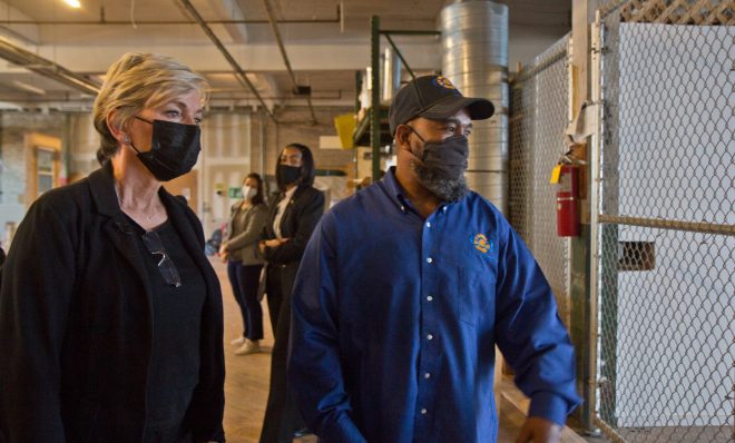 U.S. Energy Secretary Jennifer Granholm toured the ECA (Energy Coordinating Agency) an energy efficiency job training facility in Philadelphia’s Kensington neighborhood, with Jackie Robinson, ECA’s lead trainer,  on November 10, 2021. (Kimberly Paynter/WHYY)