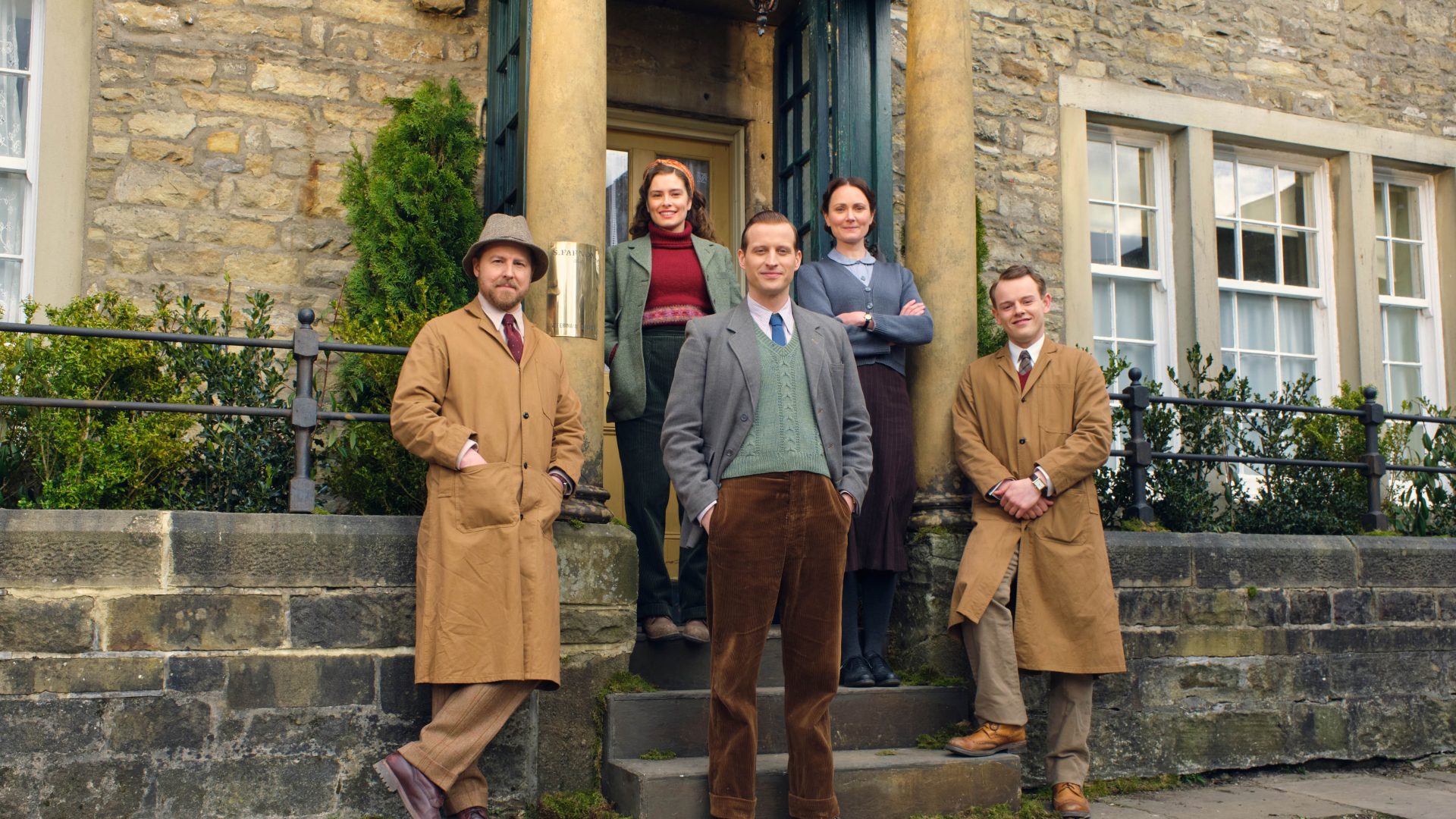 MASTERPIECE 
“All Creatures Great and Small” Season 2

Coming Soon to MASTERPIECE on PBS

Shown: FRONT LEFT TO RIGHT, SIEGFREID FARNON (SAMUEL WEST), JAMES HERRIOT (NICHOLAS RALPH) & TRISTAN FARNON (CALLUM WOODHOUSE).
BACKROW: HELEN ALDERSON (RACHEL SHENTON) & MRS HALL (ANNA MADELEY).

For editorial use only.

Courtesy of MASTERPIECE.