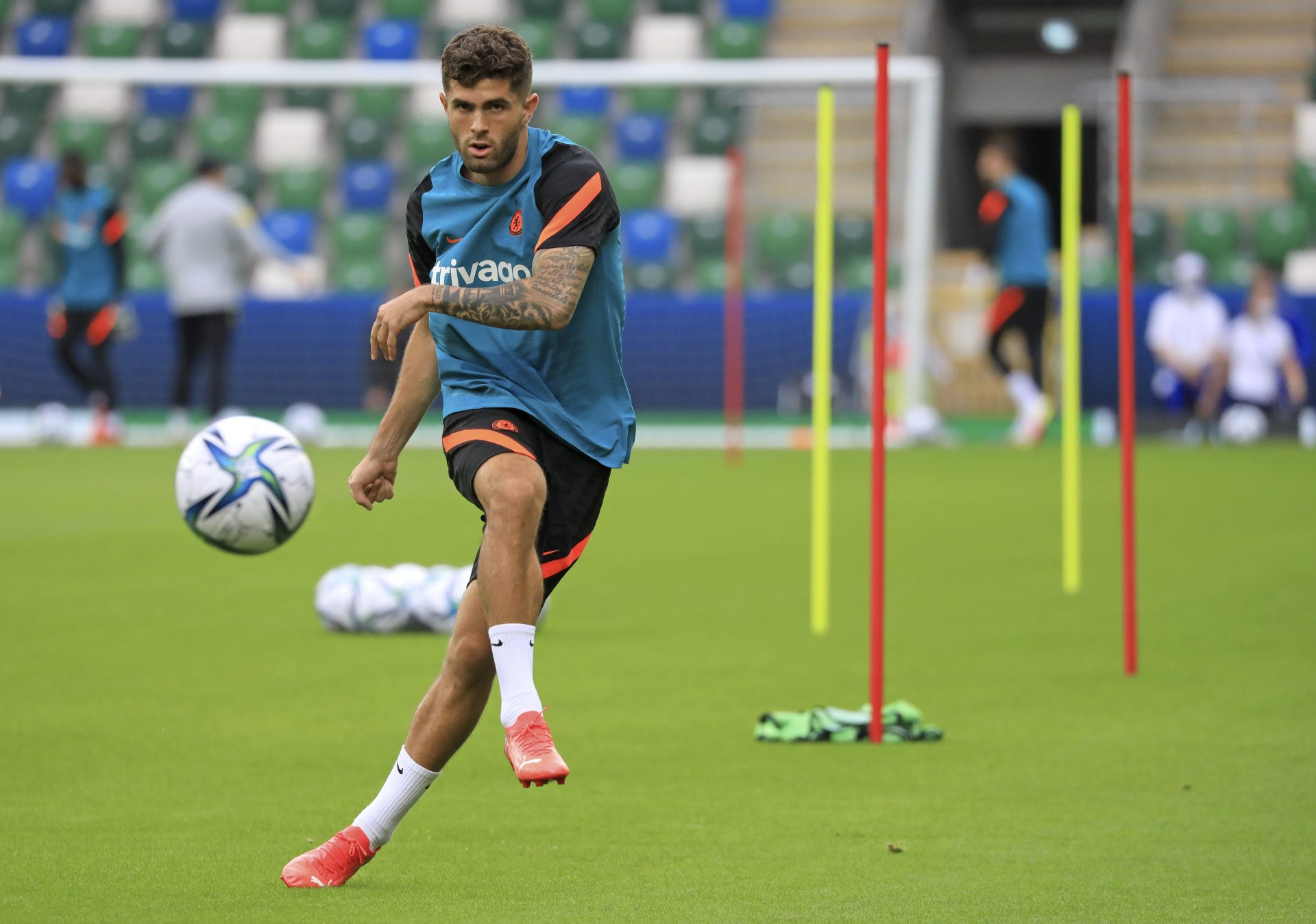 In this Aug. 10, 2021 file photo, Chelsea's Christian Pulisic kicks the ball during a training session at Windsor Park in Belfast, Northern Ireland.