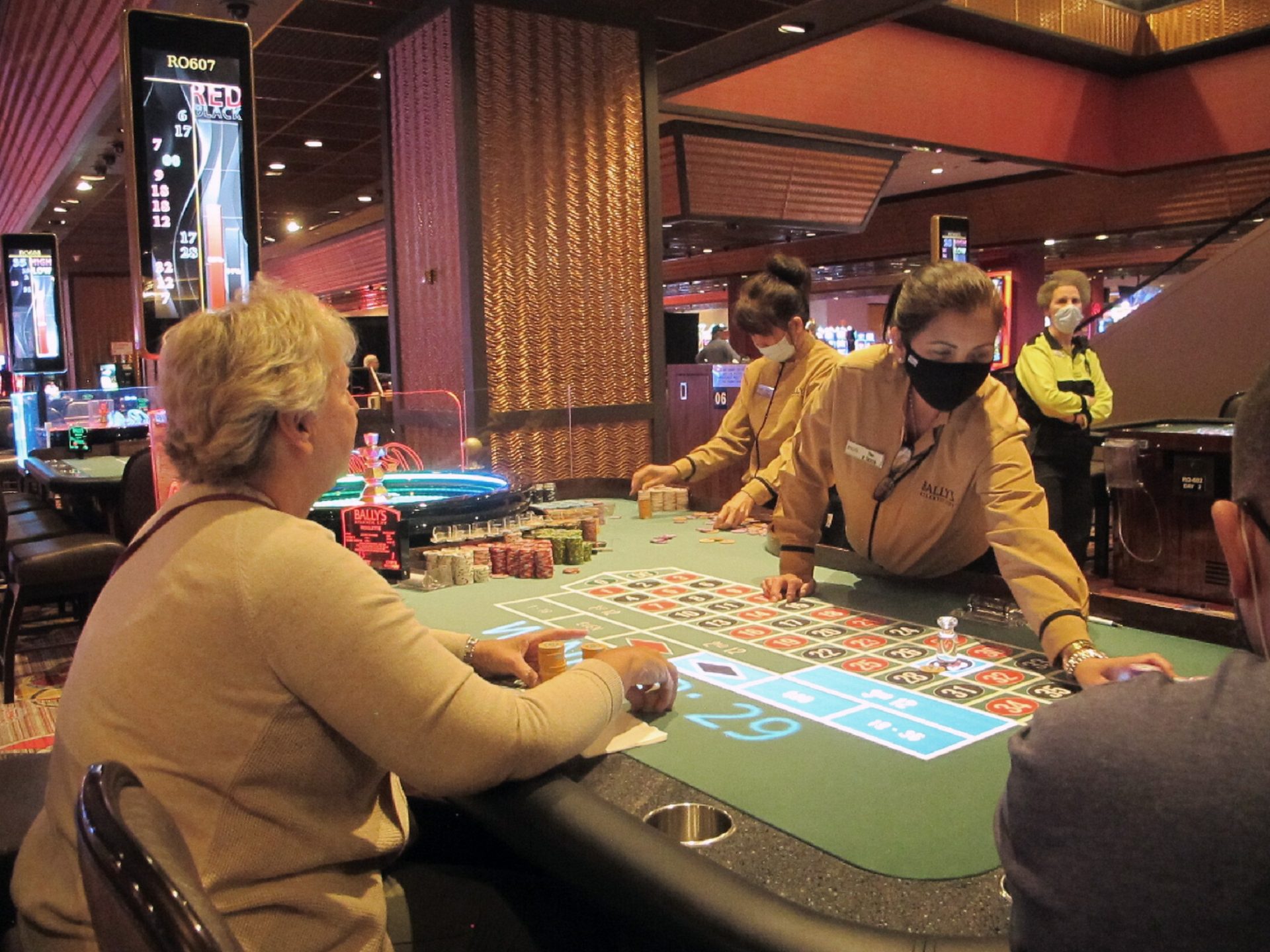 This June 23, 2021 photo shows people playing roulette at Bally's casino in Atlantic City N.J. On Oct. 25, 2021,.