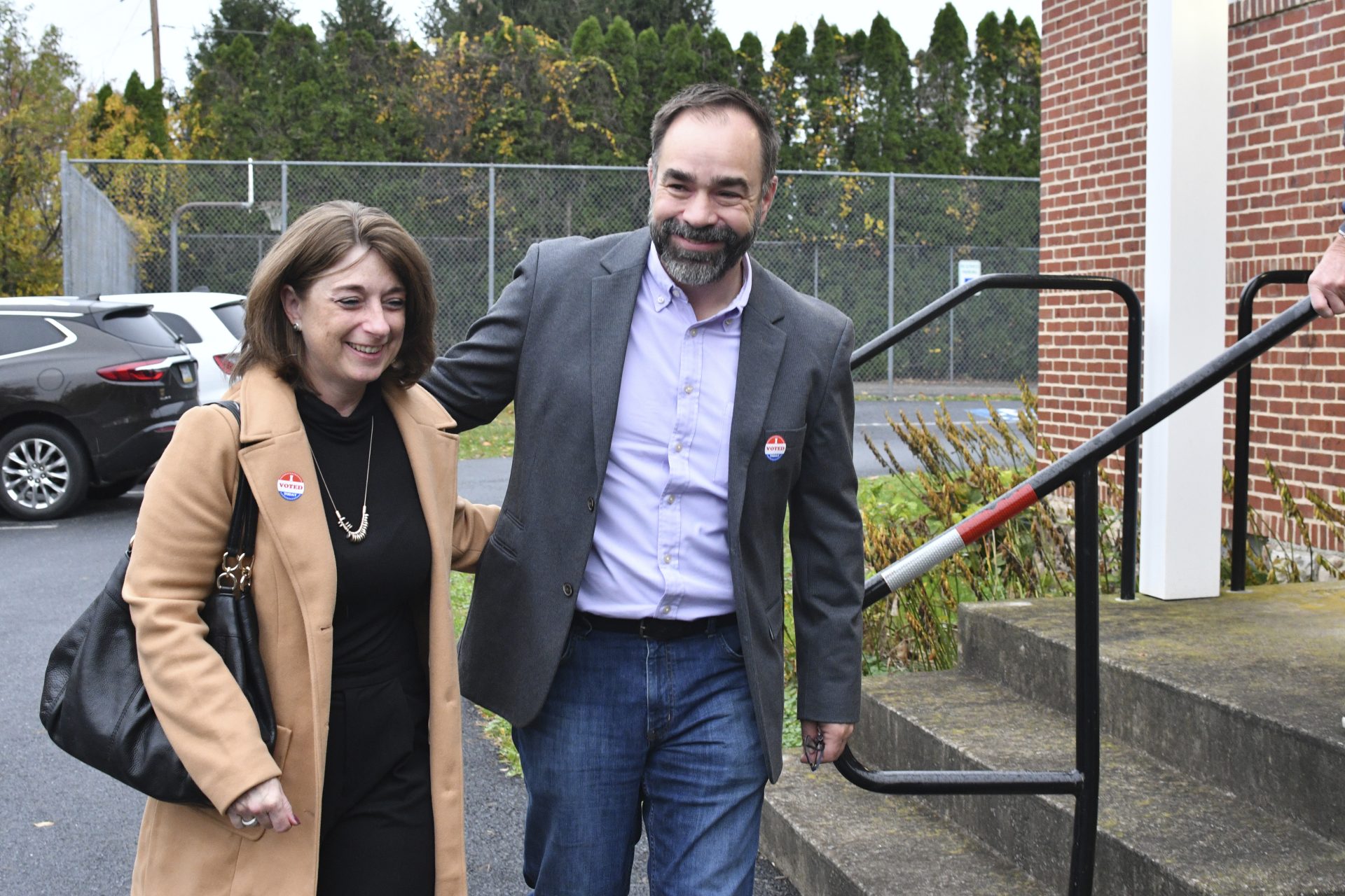 Kevin Brobson, the Republican candidate for an open seat on Pennsylvania's state Supreme Court, leaves with his wife Lauren after they voted at their polling place at Fishing Creek Community Center, Nov. 2, 2021, in Harrisburg, Pa.