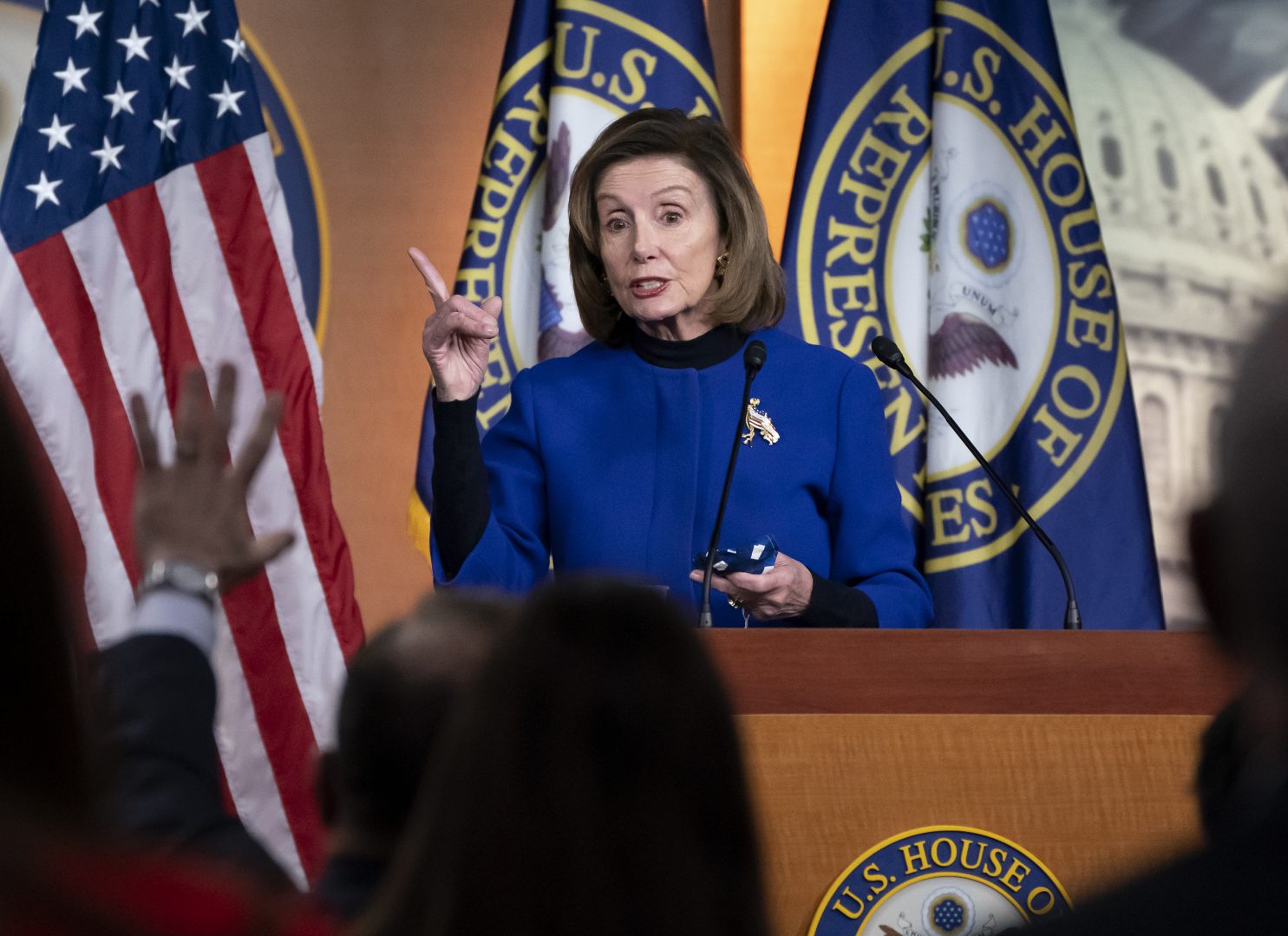 Speaker of the House Nancy Pelosi, D-Calif., updates reporters on the must-pass priority of funding the government, during a news conference at the Capitol in Washington, Thursday, Dec. 2, 2021.
