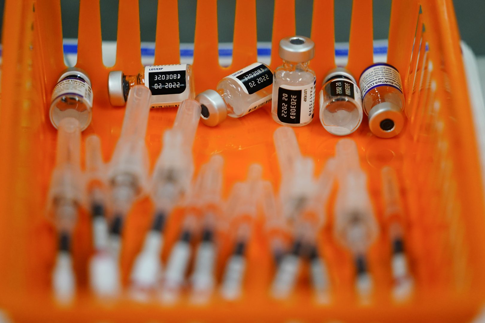A syringes and vials of the Pfizer COVID-19 vaccine at a vaccination clinic at the Keystone First Wellness Center in Chester, Pa., Wednesday, Dec. 15, 2021.