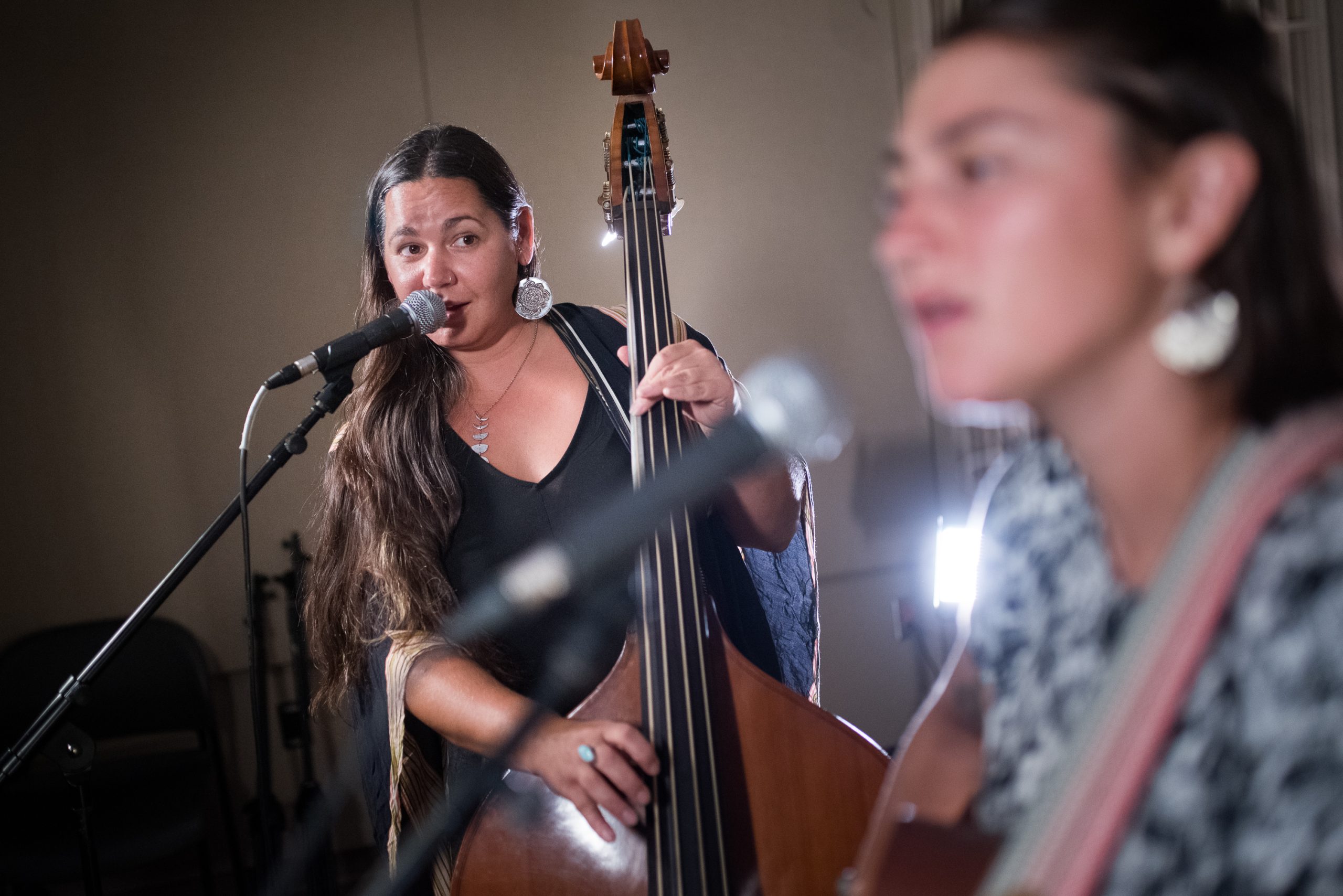 Steph Landis playing upright bass.