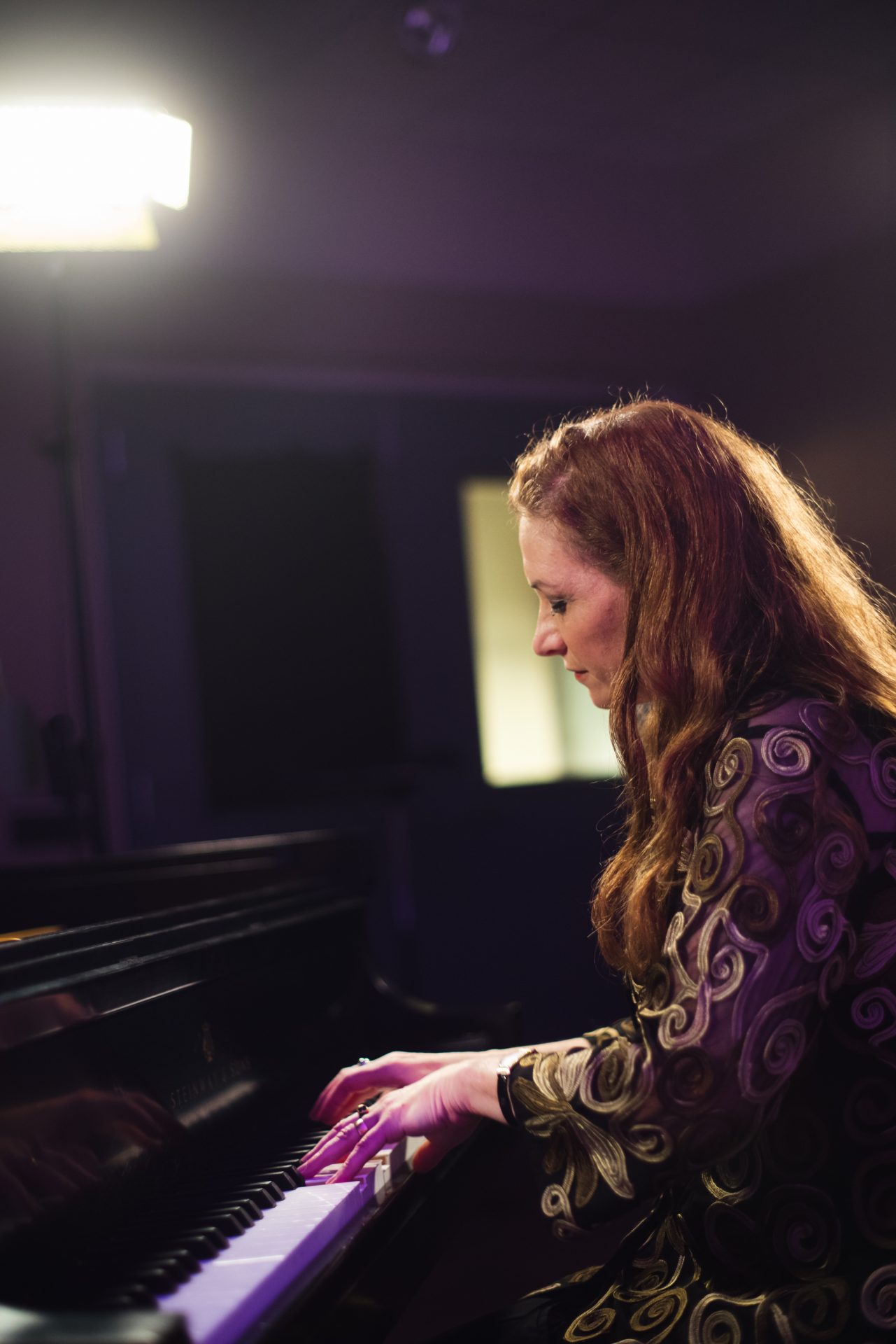 Robin Spielberg playing piano.