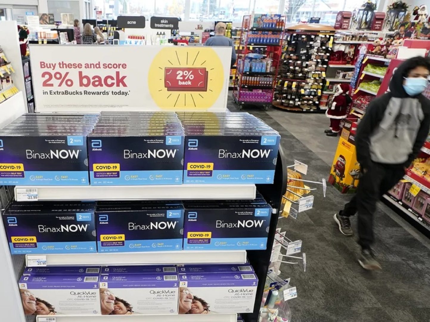 At-home coronavirus tests made by Abbott and Quidel are on sale Nov. 15 at a CVS store in Lakewood, Wash., south of Seattle. 