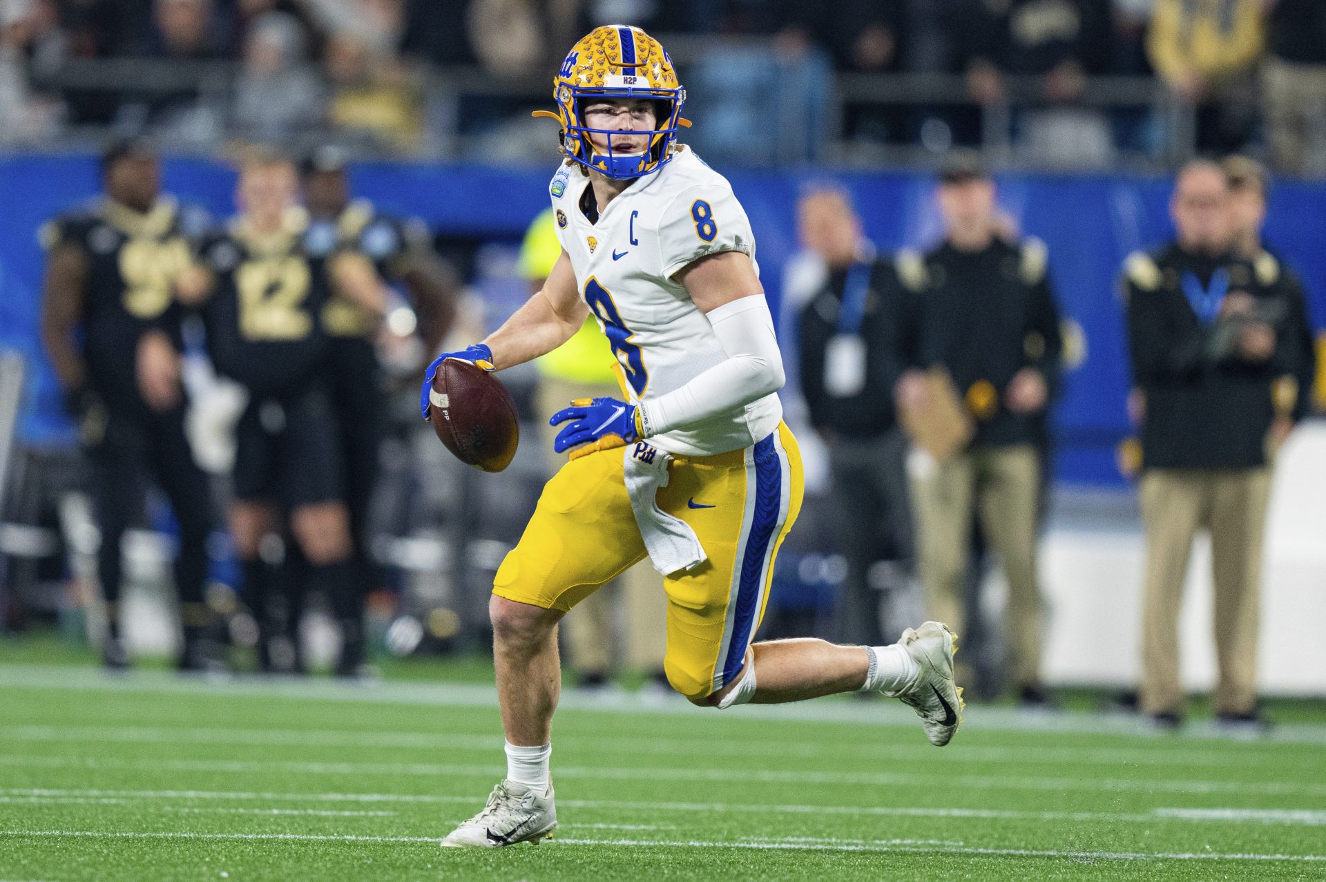 Pittsburgh Panthers quarterback Kenny Pickett (8) plays against the Wake Forest Demon Deacons during the Atlantic Coast Conference championship NCAA college football game Saturday, Dec. 4, 2021, in Charlotte, N.C.
