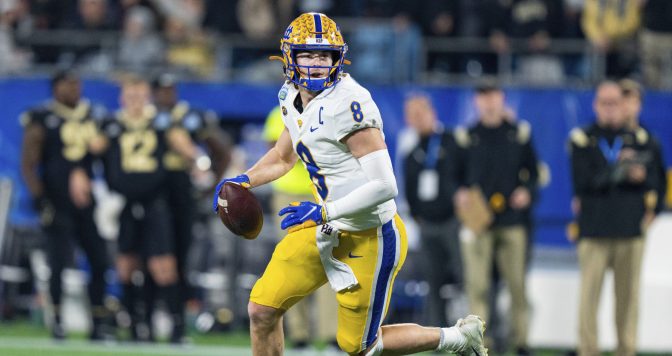 Pittsburgh Panthers quarterback Kenny Pickett (8) plays against the Wake Forest Demon Deacons during the Atlantic Coast Conference championship NCAA college football game Saturday, Dec. 4, 2021, in Charlotte, N.C.