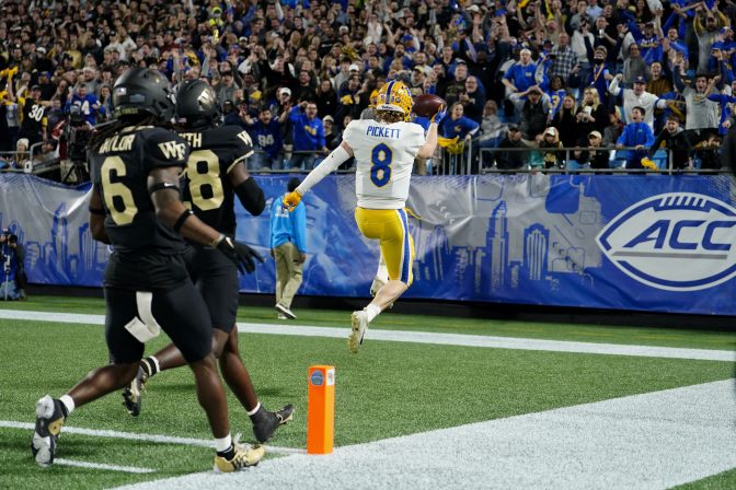 Pittsburgh quarterback Kenny Pickett celebrates after scoring against Wake Forest during the first half of the Atlantic Coast Conference championship NCAA college football game Saturday, Dec. 4, 2021, in Charlotte, N.C.