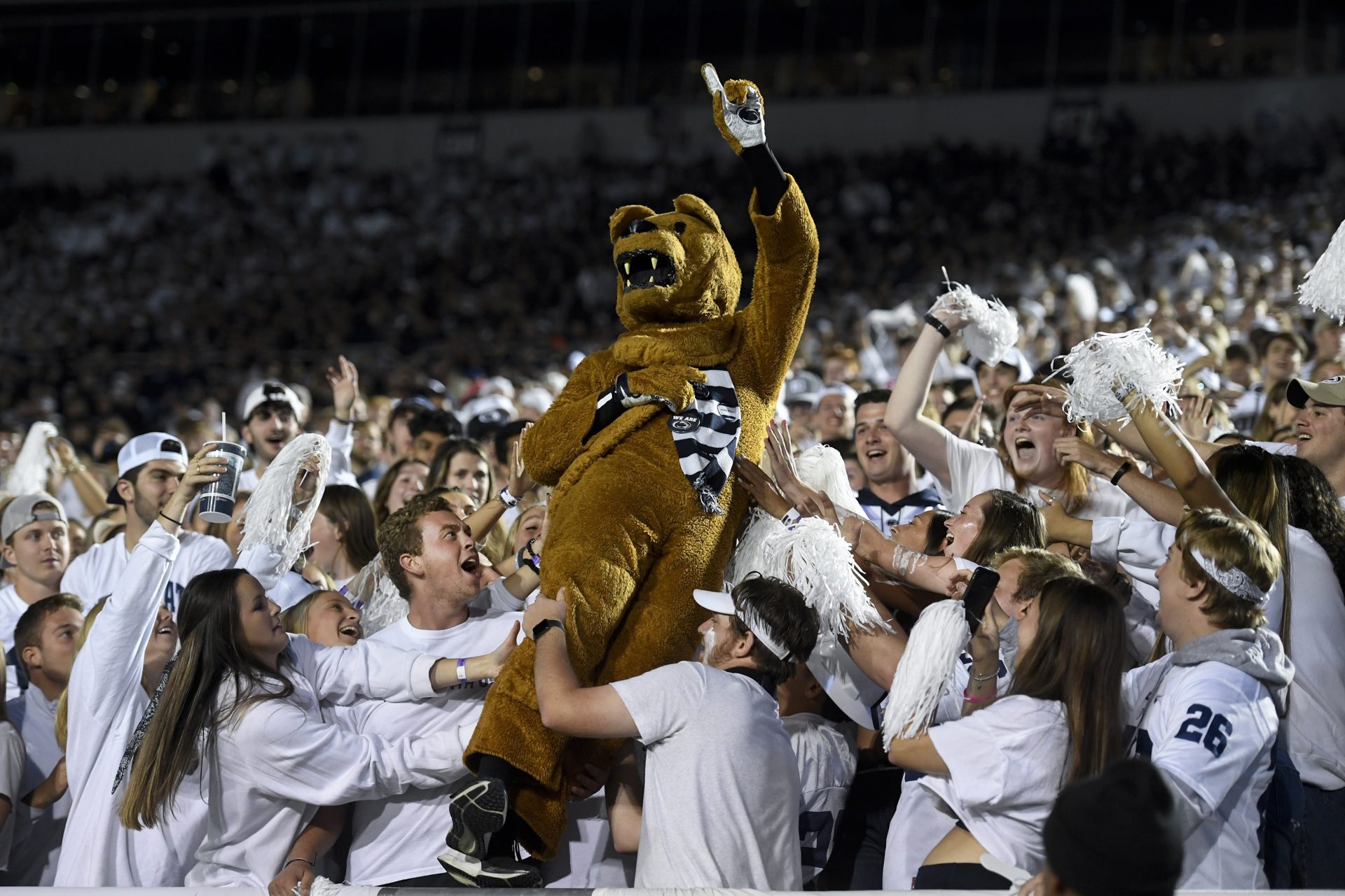 The Penn State Nittany Lion mascot celebrates with the student section during an NCAA college football game against Indiana in State College, Pa., on Saturday, Oct. 02, 2021.