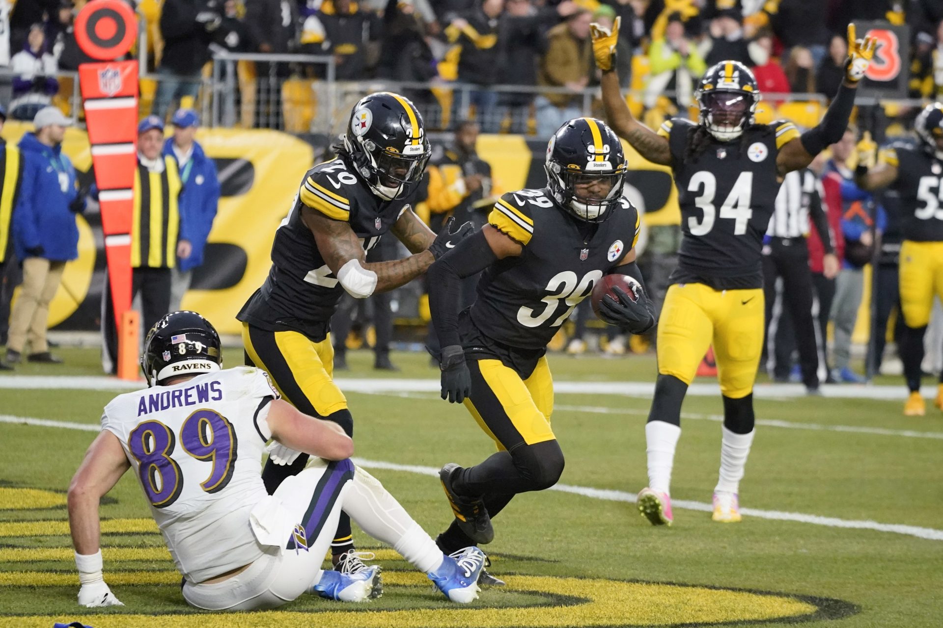 Pittsburgh Steelers free safety Minkah Fitzpatrick (39) celebrates after he intercepted a pass to Baltimore Ravens tight end Mark Andrews (89) during the first half of an NFL football game, Sunday, Dec. 5, 2021, in Pittsburgh.