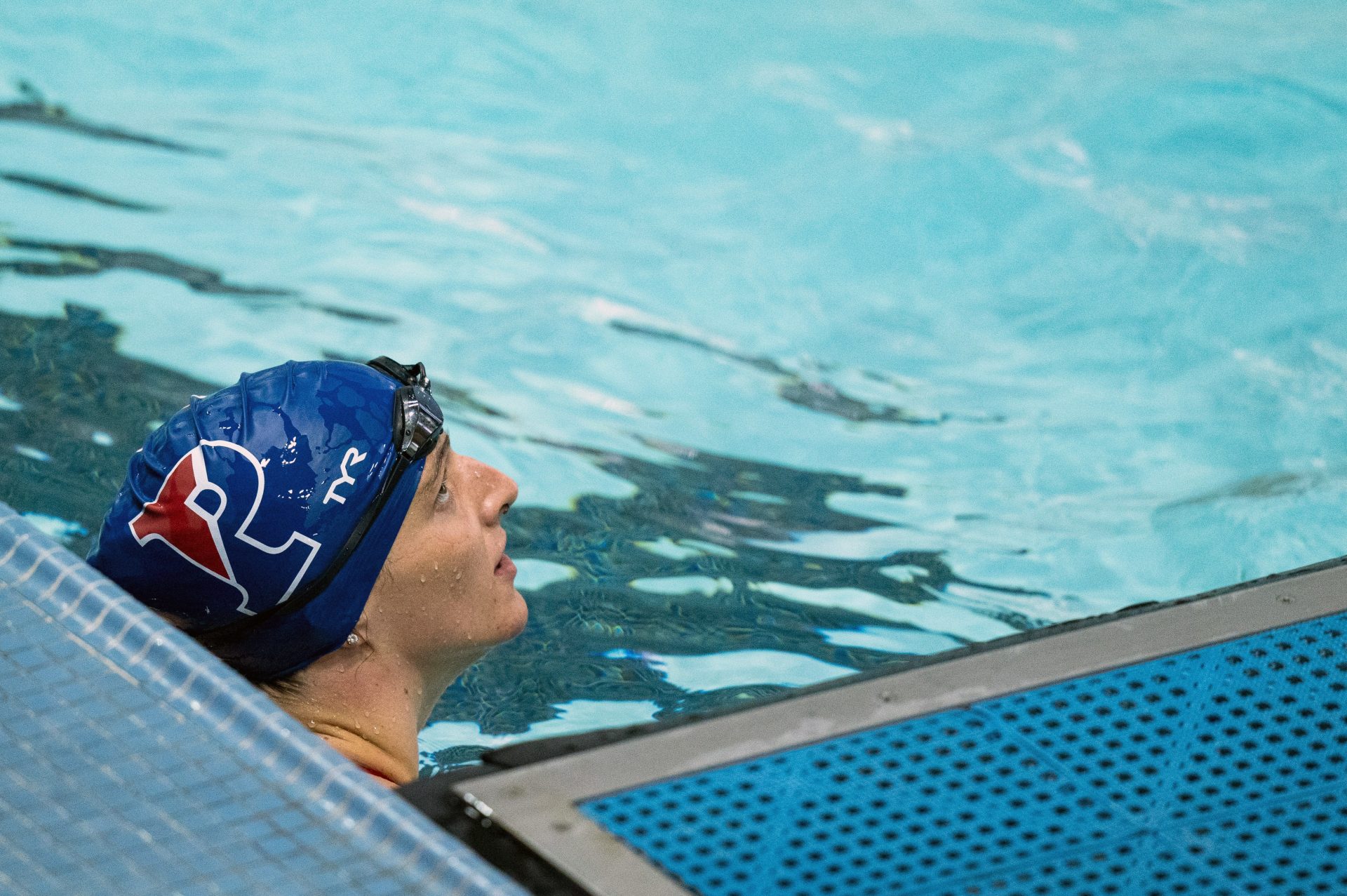 Pennsylvania's Lia Thomas looks on during a swim meet, Saturday, Jan. 8, 2022, in Philadelphia. The NCAA has adopted a sport-by-sport approach for transgender athletes, bringing the organization in line with the U.S. and International Olympic Committees.