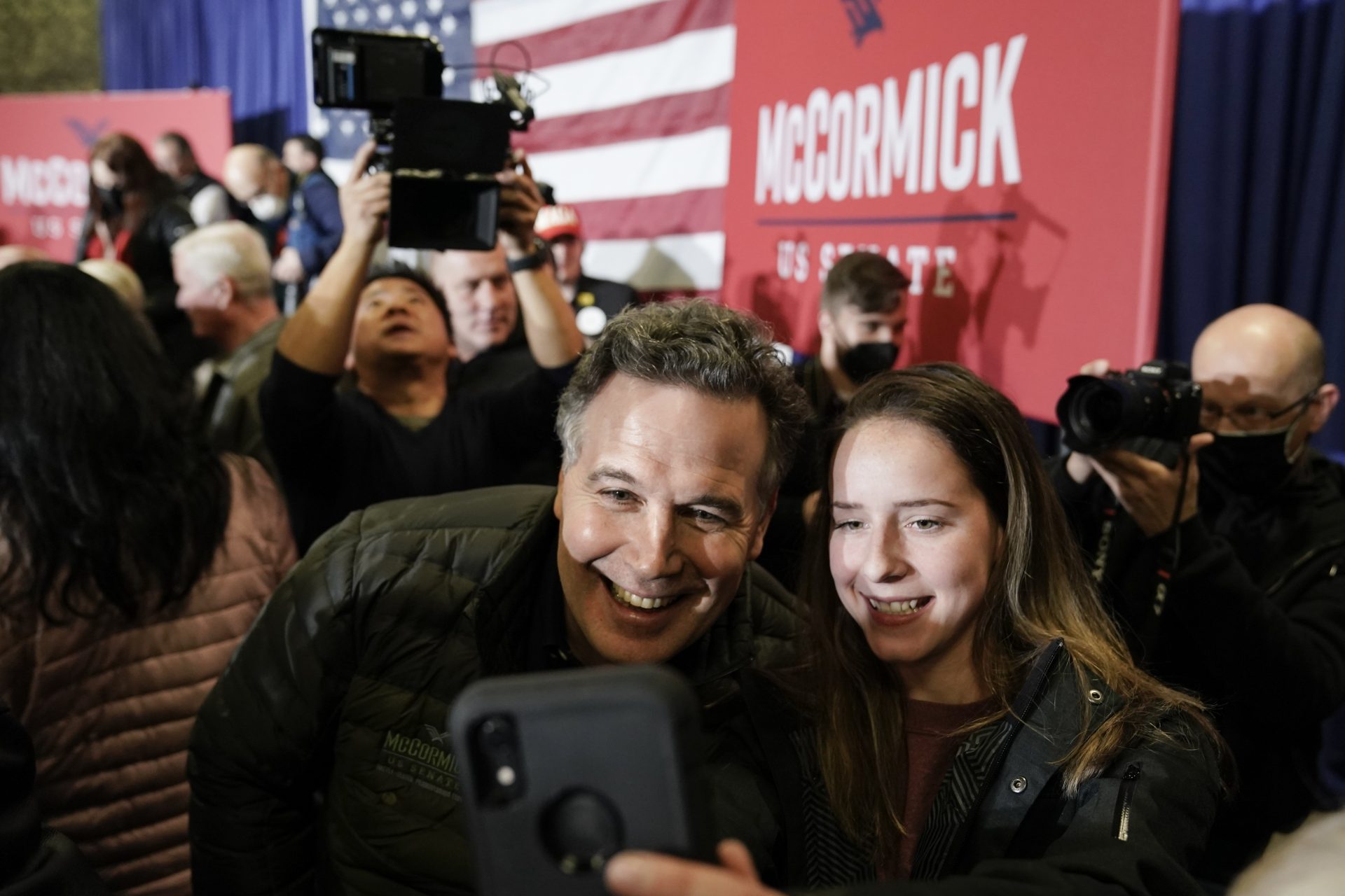 Dave McCormick, a Republican candidate for U.S. Senate in Pennsylvania, meets with attendees during a campaign event in Coplay, Pa., Tuesday, Jan. 25, 2022.