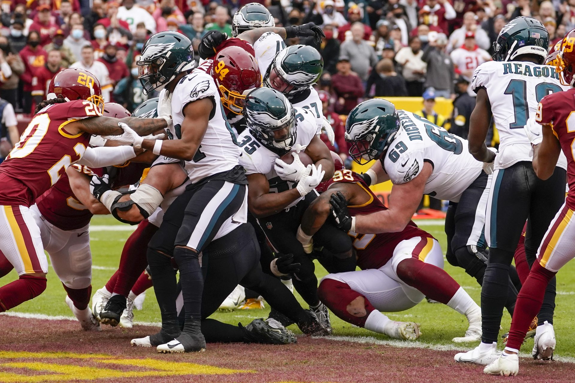 Philadelphia Eagles running back Boston Scott (35) scores a touchdown against the Washington Football Team during the first half of an NFL football game, Sunday, Jan. 2, 2022, in Landover, Md.