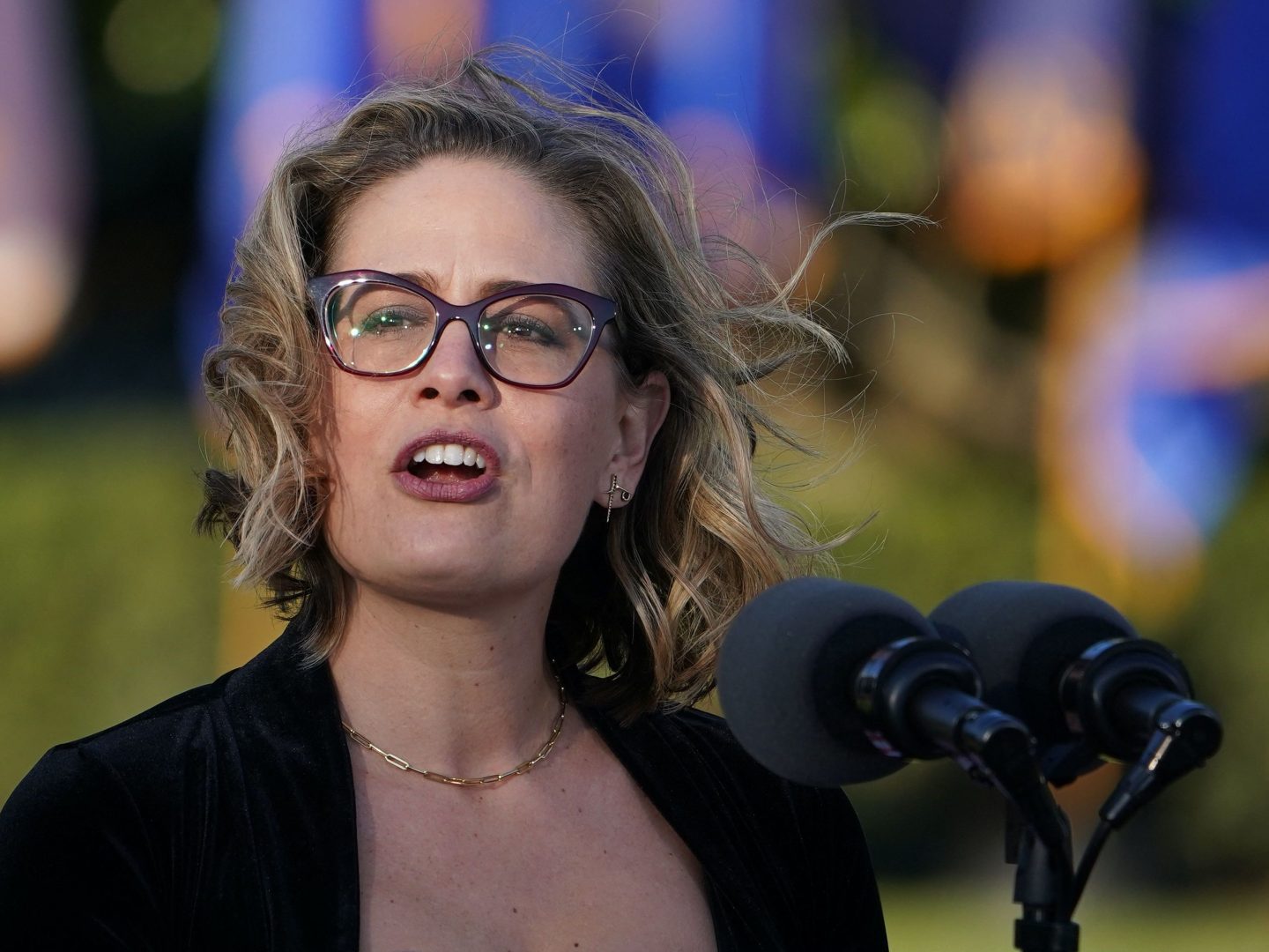US Senator Kyrsten Sinema (D-AZ) speaks during a signing ceremony for H.R. 3684, the Infrastructure Investment and Jobs Act on the South Lawn of the White House in Washington, DC on November 15, 2021. (Photo by MANDEL NGAN / AFP) (Photo by MANDEL NGAN/AFP via Getty Images)