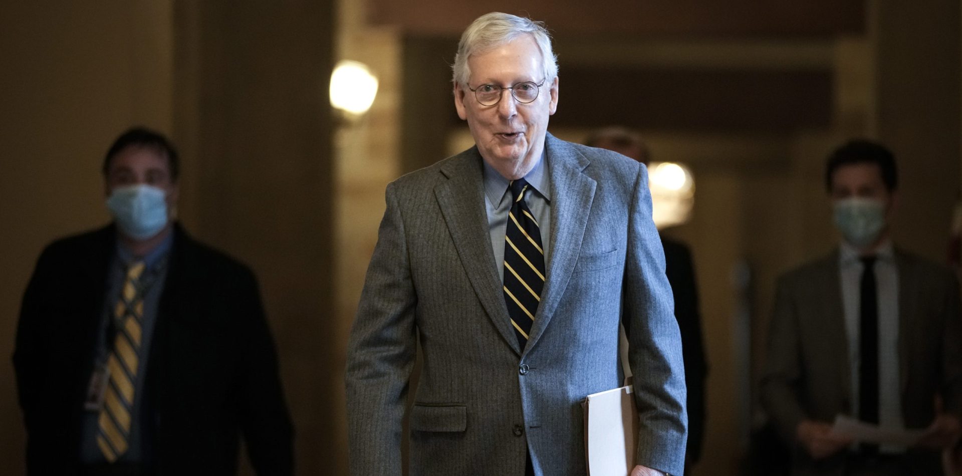 WASHINGTON, DC - JANUARY 5: Senate Minority Leader Mitch McConnell (R-KY) leaves his office and walks to the Senate floor at the U.S. Capitol on January 5, 2022 in Washington, DC. Congress is preparing will mark the one year anniversary of the January 6 Capitol riot on Thursday. (Photo by Drew Angerer/Getty Images)