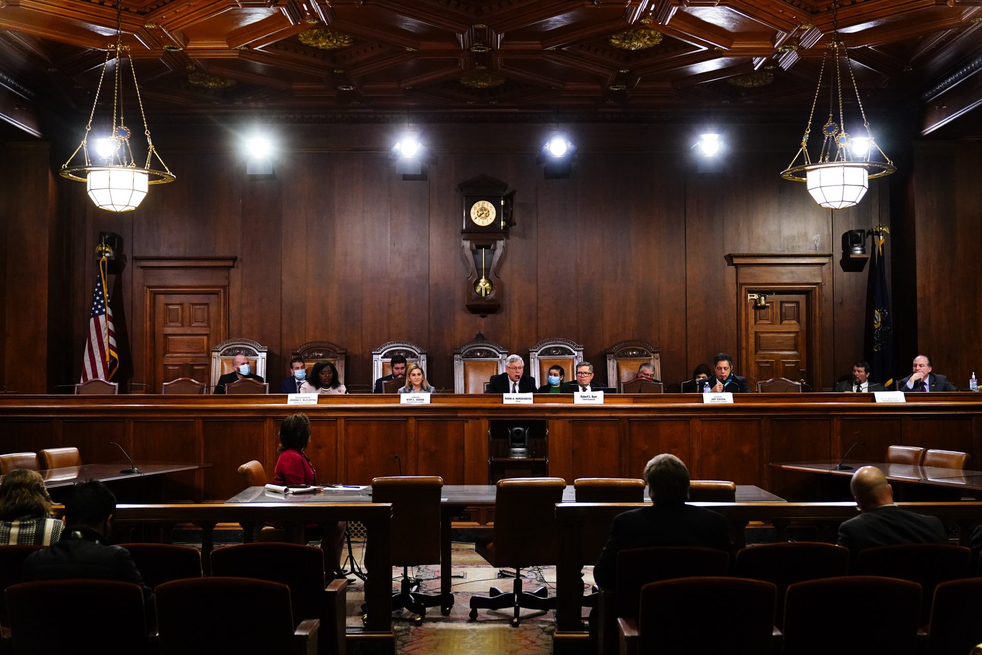 Chairman Mark Nordenberg, center, speaks during a meeting of the Pennsylvania Legislative Reapportionment Commission at the Capitol in Harrisburg, Pa., Thursday, Dec. 16, 2021.