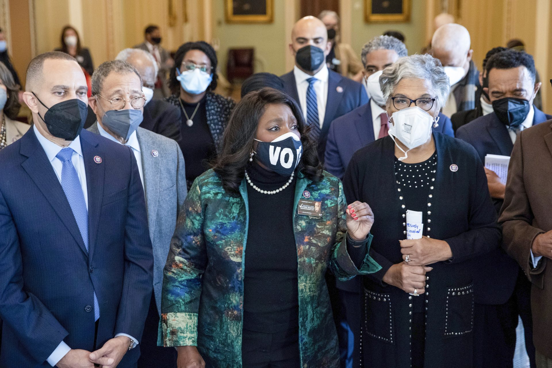 In the front row, from left, Rep. Hakeem Jeffries, D-N.Y., Rep. Terri Sewell and D-Ala., Rep. Joyce Beatty, D-Ohio, alongside other members of the Congressional Black Caucus, speak near the Senate chamber about their support of voting rights legislation at the Capitol in Washington, Wednesday, Jan. 19, 2022.