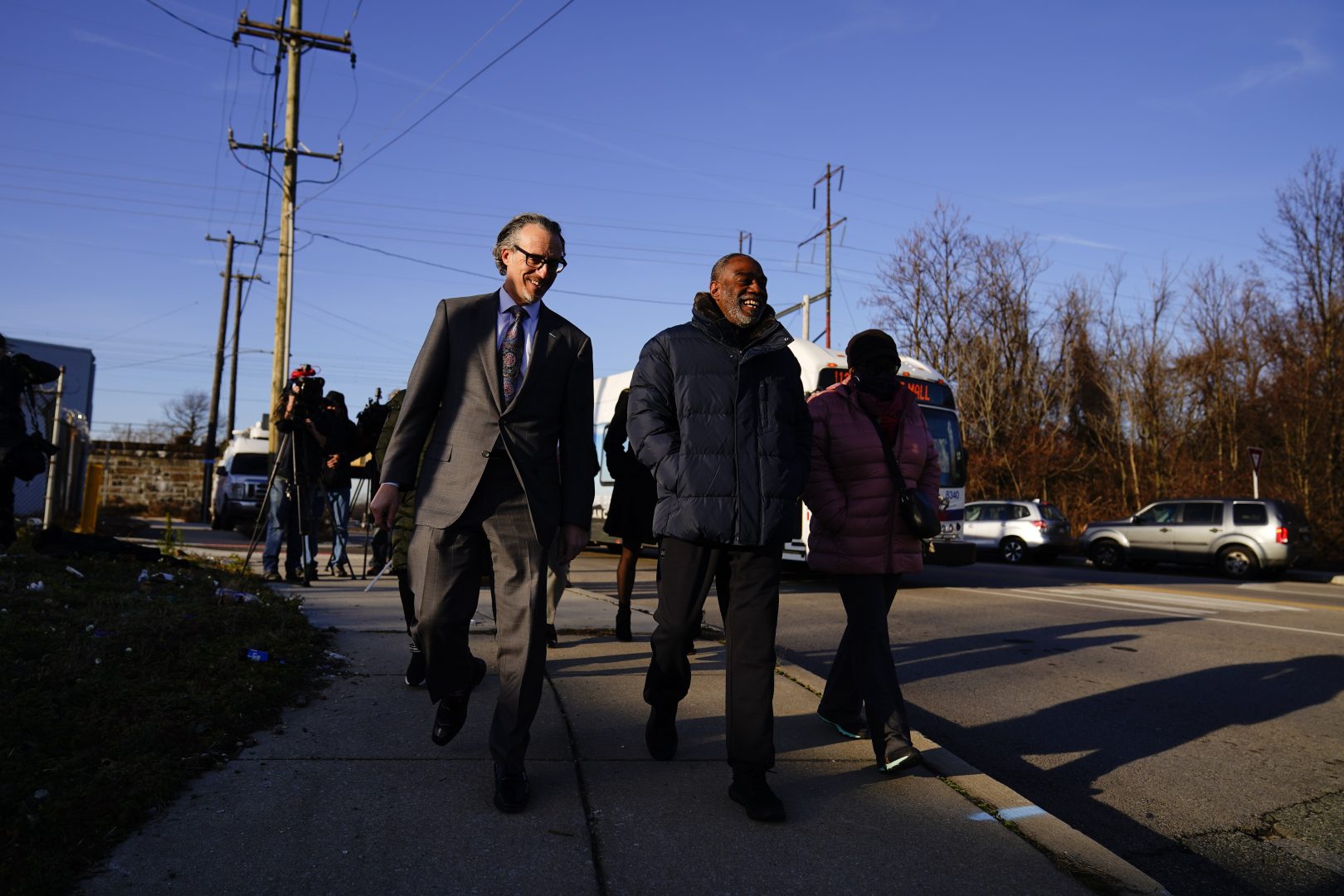 Willie Stokes, center, and lawyer Michael Diamondstein walk in Chester, Pa., on Tuesday, Jan. 4, 2022, after Stokes' 1984 murder conviction was overturned because of perjured witness testimony. Stokes was serving a life sentence and spent decades in prison before learning the witness who testified against him at a 1984 court hearing soon pleaded guilty to perjury over the testimony. 