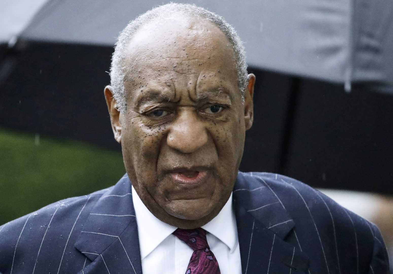 FILE - Bill Cosby arrives for a sentencing hearing following his sexual assault conviction at the Montgomery County Courthouse in Norristown Pa., on Sept. 25, 2018. A lawyer for Cosby asked the U.S. Supreme Court on Monday, Jan. 31, 2022, to reject a bid by prosecutors to revive his criminal sex assault case.  The 84-year-old actor and comedian has been free since June 2021, when a Pennsylvania appeals court overturned his conviction and released him from prison after nearly three years.  (AP Photo/Matt Rourke, File)