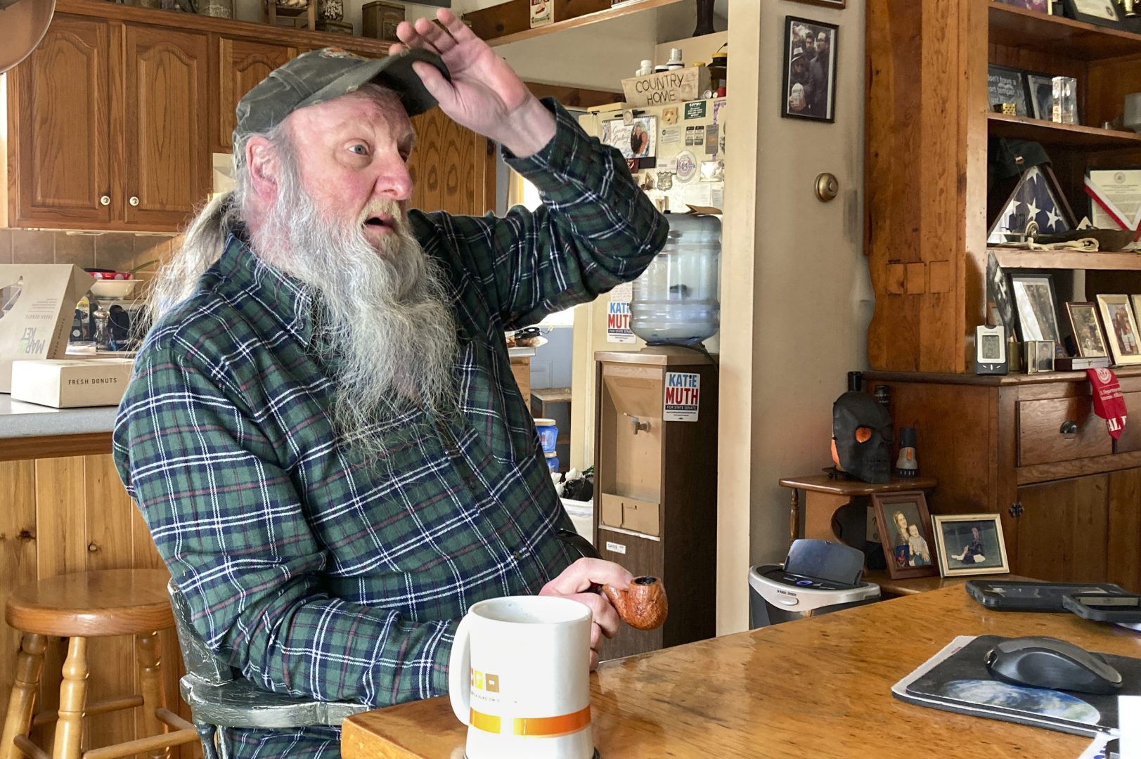 Ray Kemble talks about his water issues in his home in Dimock, Pa., Feb. 14, 2022. Faulty gas wells drilled by Cabot Oil & Gas were blamed for leaking methane into the groundwater in Dimock, in one of the best-known pollution cases ever to emerge from the U.S. drilling and fracking boom. 