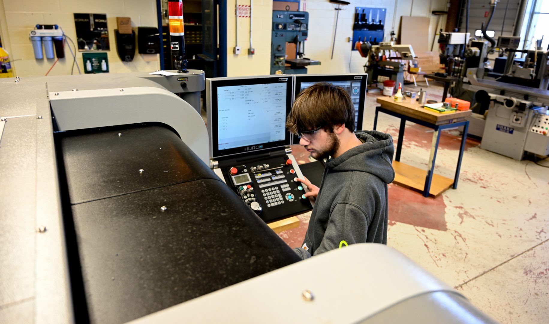 Isaac Graby, 17, sets up a CNC machine to make soft jaws to hold the parts he and his classmates will make for NASA that will be used on the International Space Station at the Lebanon County Career and Technology Center on Feb. 2, 2022