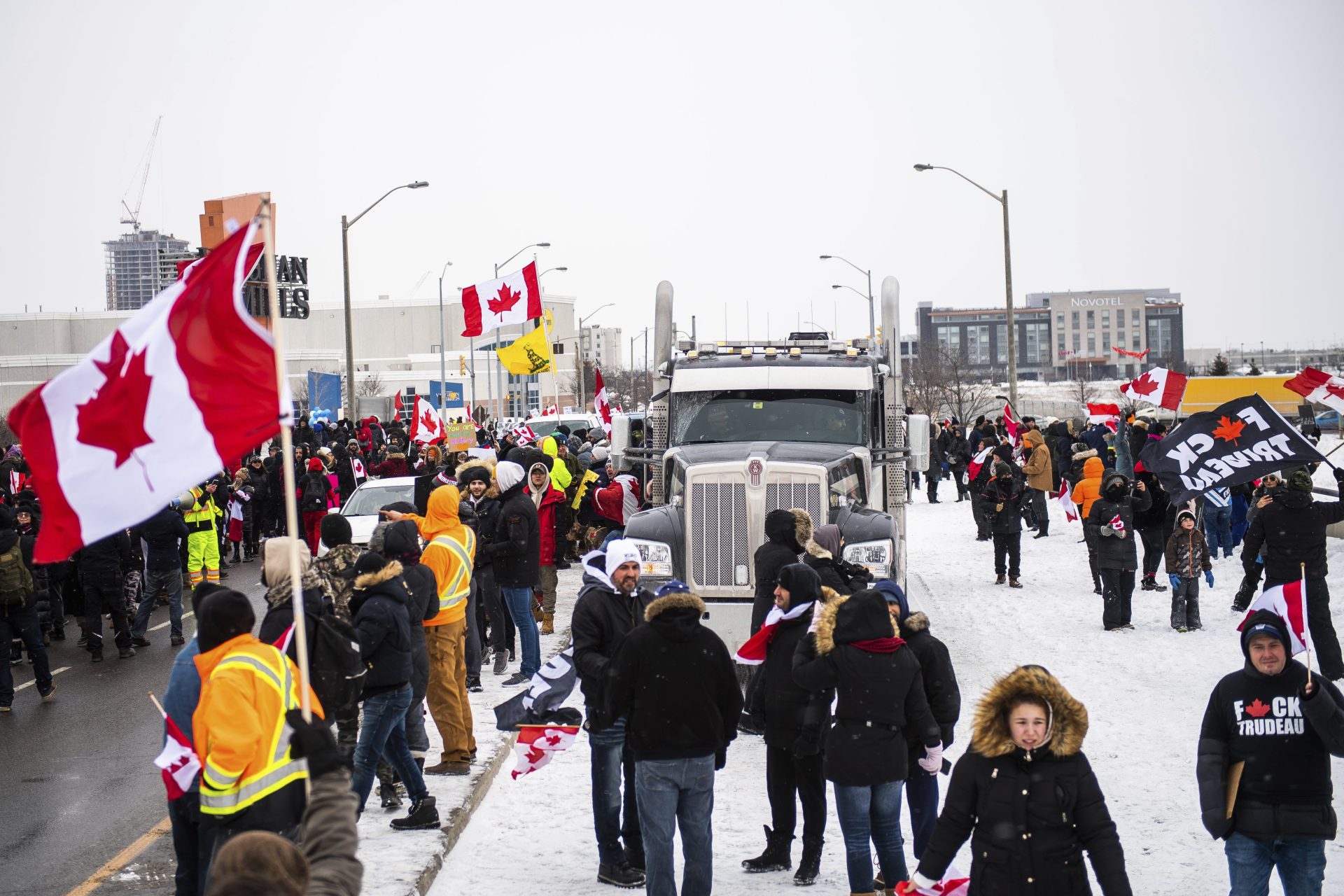 Protestors show their support for the Freedom Convoy of truck drivers who are making their way to Ottawa to protest against COVID-19 vaccine mandates by the Canadian government on Thursday, Jan. 27, 2022, in Vaughan.