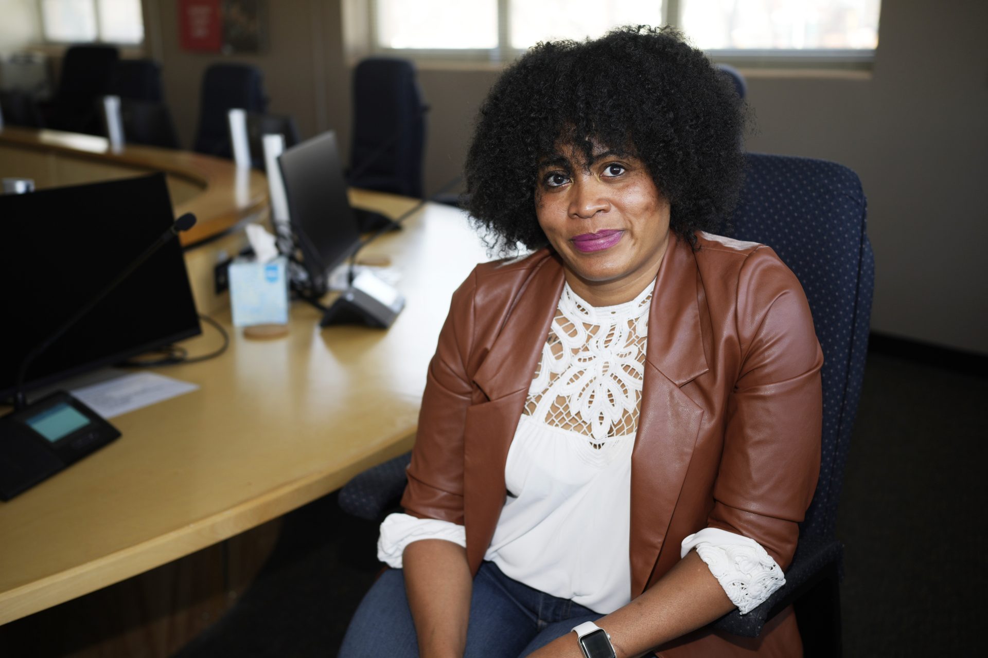 Alexis Knox-Miller, equity director for the Colorado Springs, Colo., school system, poses on Friday, Feb. 4, 2022 in the boardroom in the district's main office in Colorado Springs, Colo.