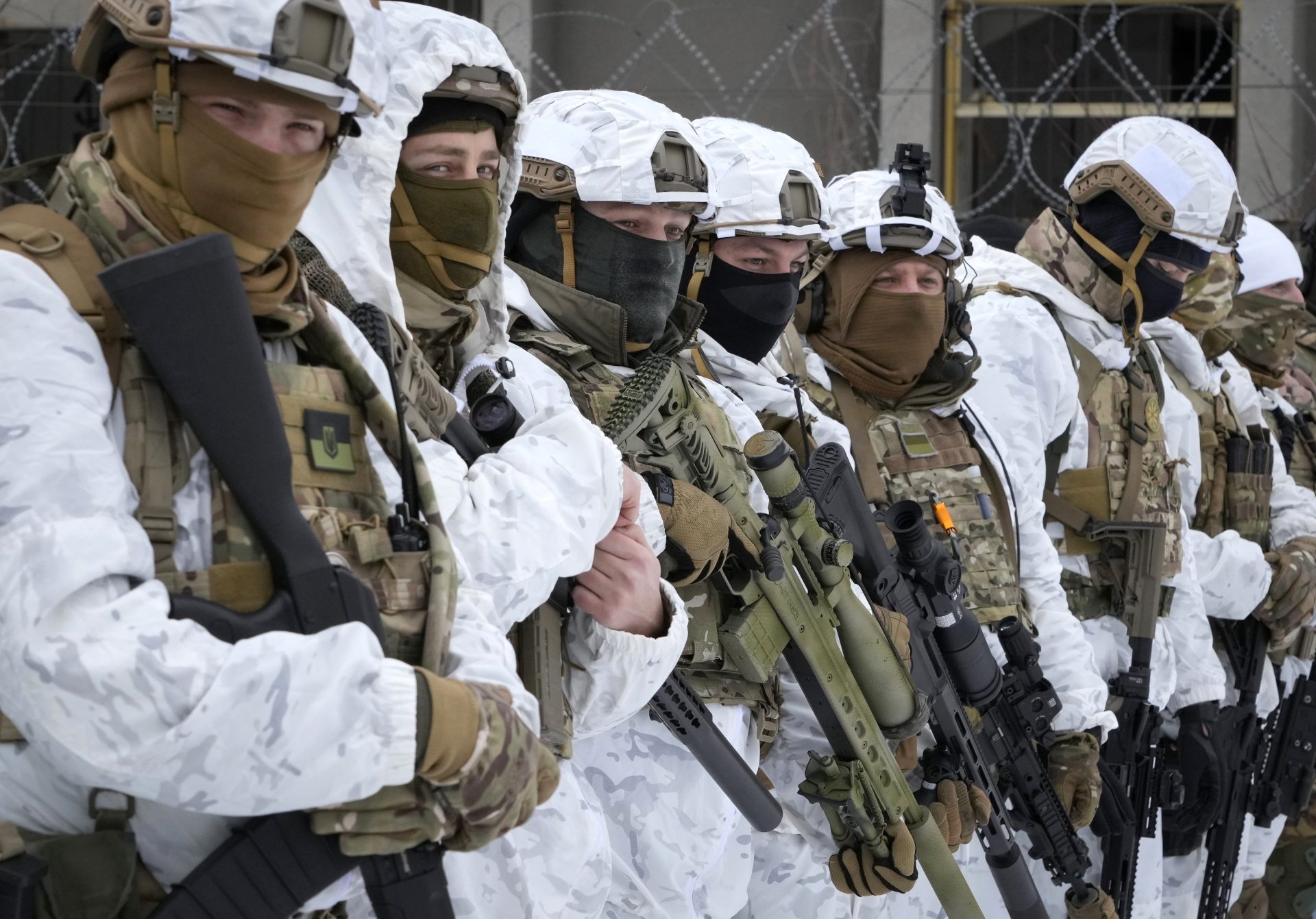 Local residents attend an all-Ukrainian training campaign "Don't panic! Get ready!" close to Kyiv, Ukraine, Sunday, Feb. 6, 2022.