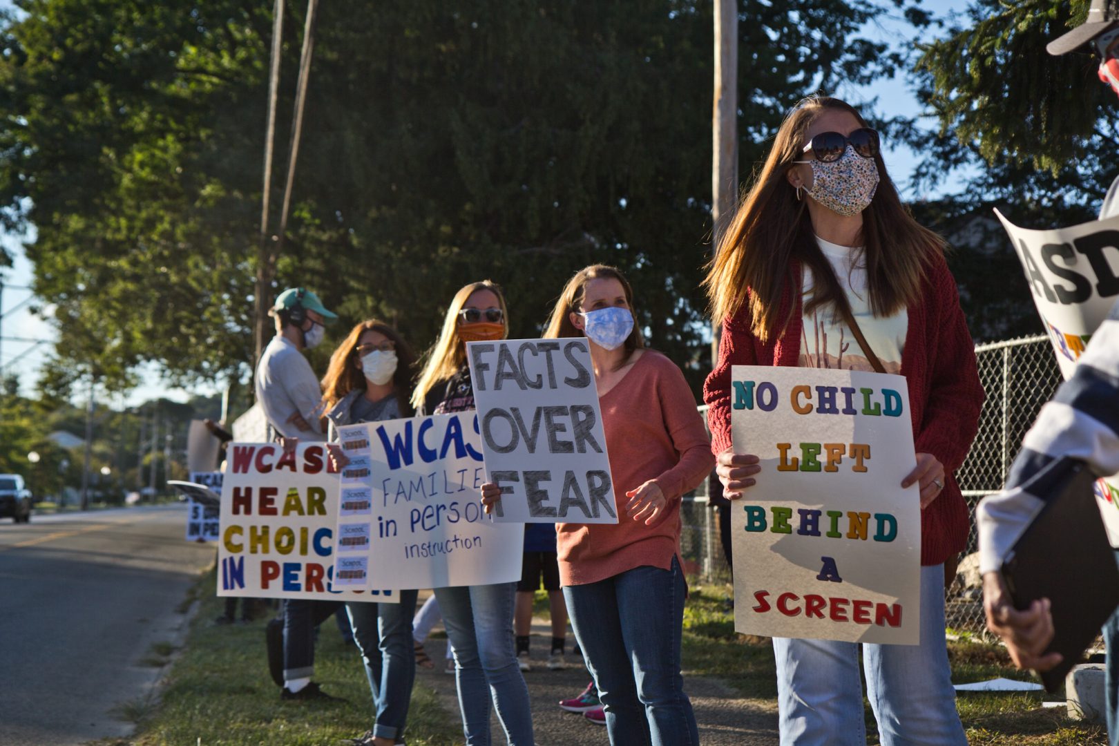 File photo: Parents and students from the Downingtown and West Chester, Pa., School Districts held a roadside protest Monday to demand administrators allow in-person learning for families that want it.