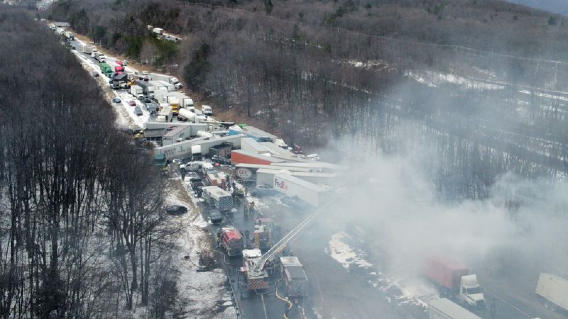 The smoky aftermath of a massive pile-up during a snow squall March 28, 2022, on Interstate 81 North in Schuylkill County, Pennsylvania.