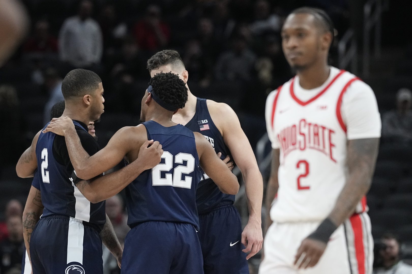 Penn State's Jalen Pickett (22) talks with his teammates during the second half of an NCAA college basketball game against Ohio State at the Big Ten Conference tournament, Thursday, March 10, 2022, in Indianapolis. (AP Photo/Darron Cummings)