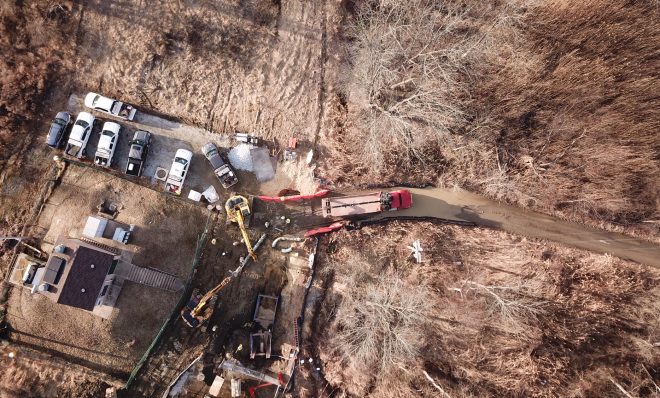 Aerial views of pipe being laid at a Mariner East construction site in Delaware County. The company says construction is complete but residents say this work is not remediation but construction.