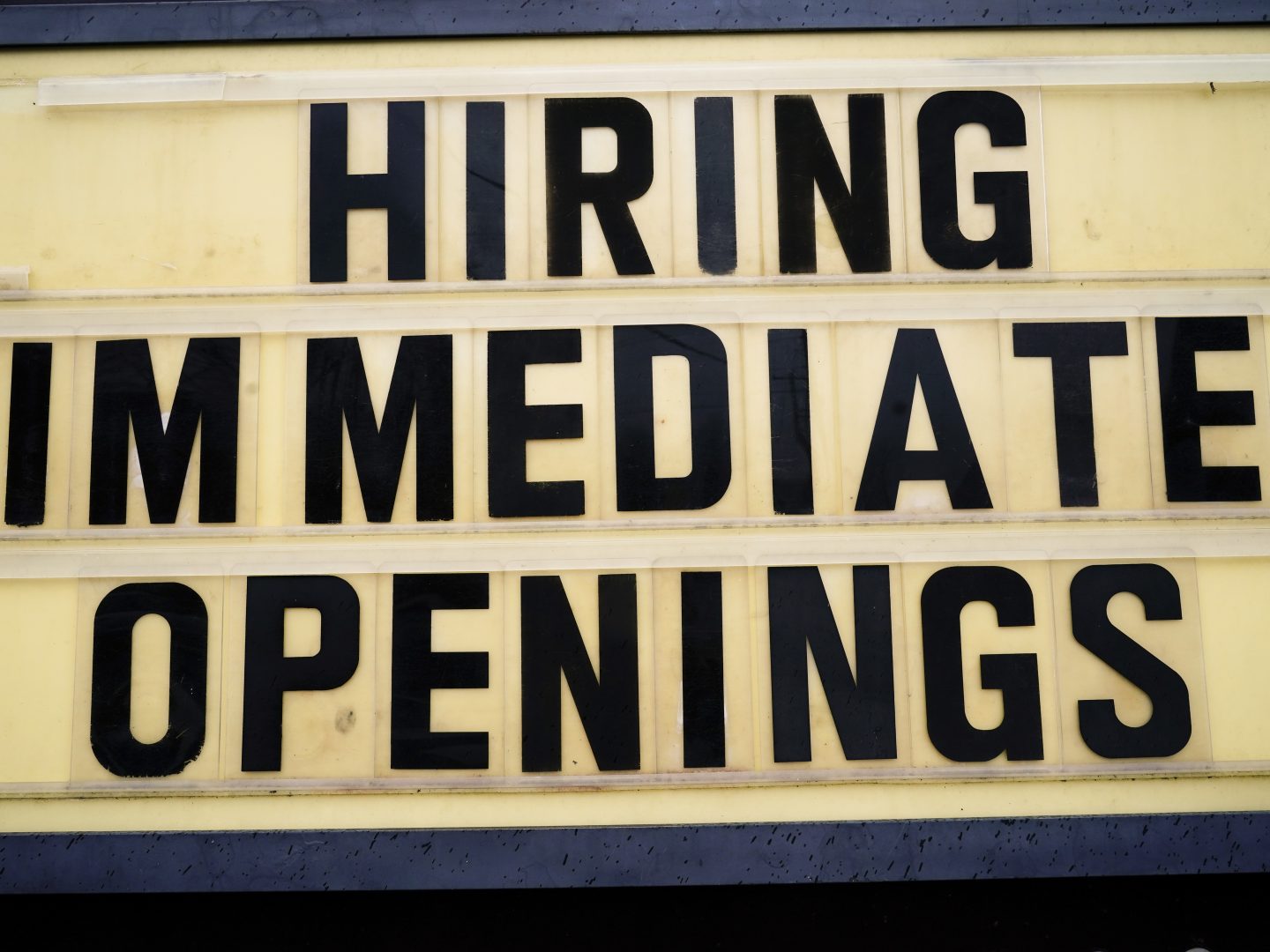 A hiring sign is posted outside business in Huntingdon Valley, Pa., Tuesday, Feb. 22, 2022. (AP Photo/Matt Rourke)