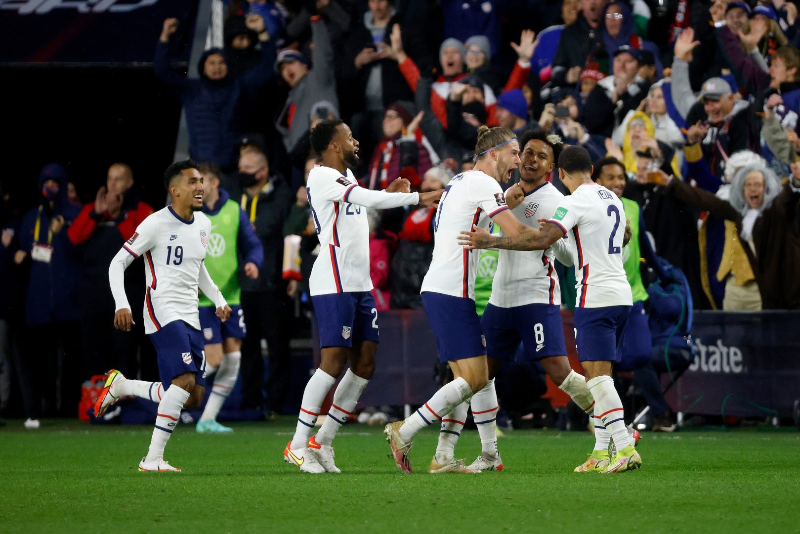 CINCINNATI, OH - NOVEMBER 12:  Weston McKennie #8 of the United States is congratulated by his teammates after scoring a goal during the FIFA World Cup 2022 Qualifier match against Mexico at TQL Stadium on November 12, 2021 in Cincinnati, Ohio. The United States defeated Mexico 2-0. 