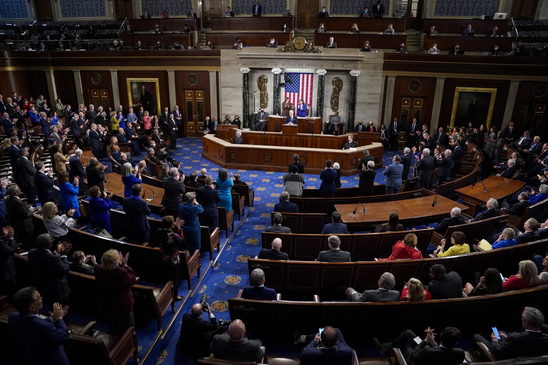 President Joe Biden delivers his State of the Union address to a joint session of Congress at the Capitol, Tuesday, March 1, 2022, in Washington, as Vice President Kamala Harris and Speaker of the House Nancy Pelosi of Calif., look on.