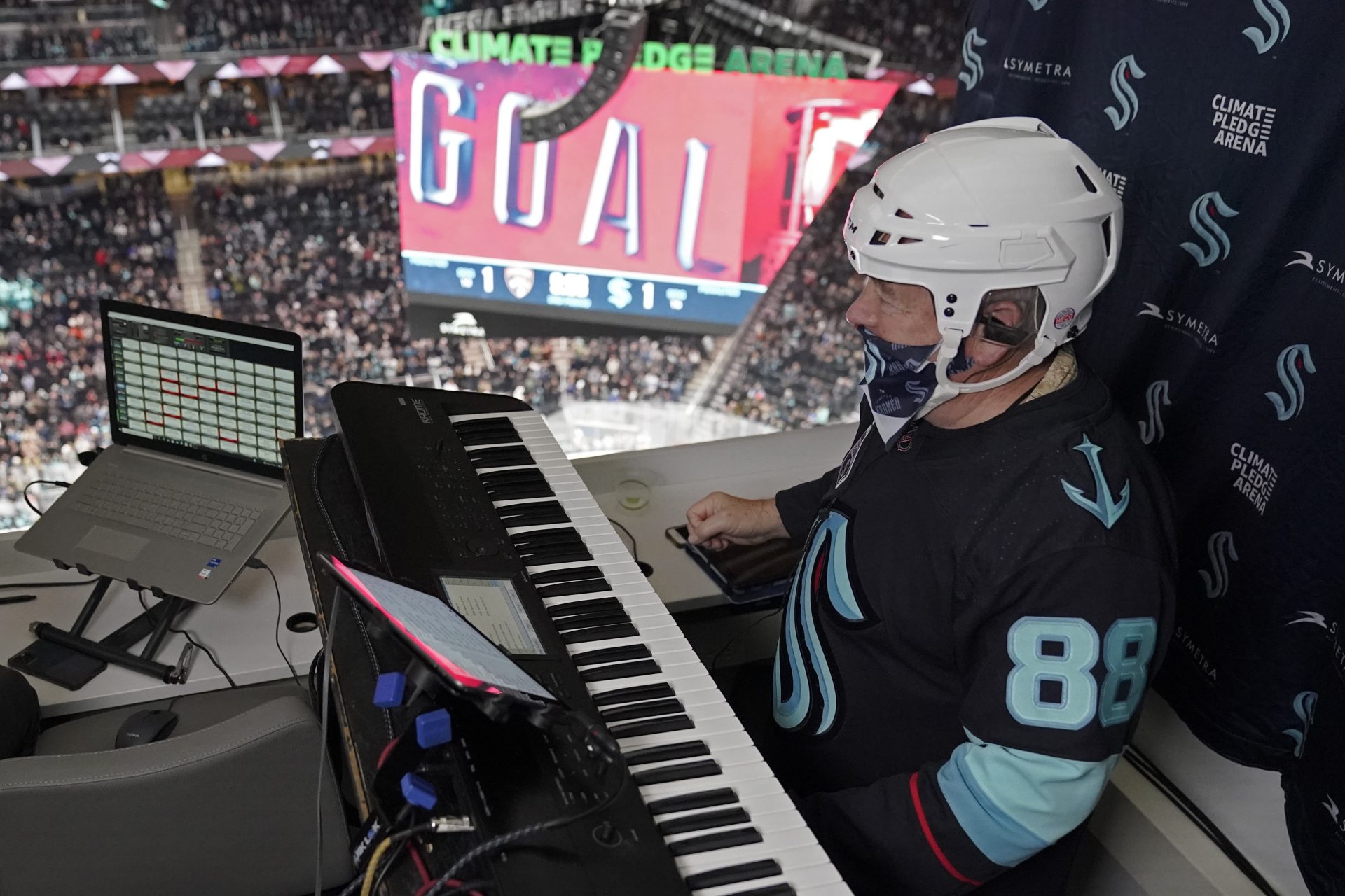 Seattle Kraken organist Rod Masters performs after a goal was scored during an NHL hockey game against the Florida Panthers at Climate Pledge Arena, on Jan. 23, 2022, in Seattle.