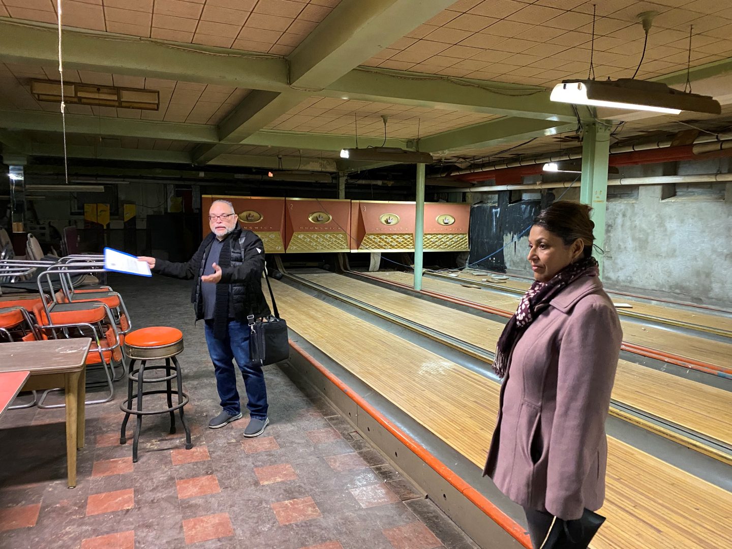Rafael Torres and  Maribel González, cofounders of WEPA in Lebanon, tour the new home for the organization's forthcoming technical career center in the former Elks Lodge. 