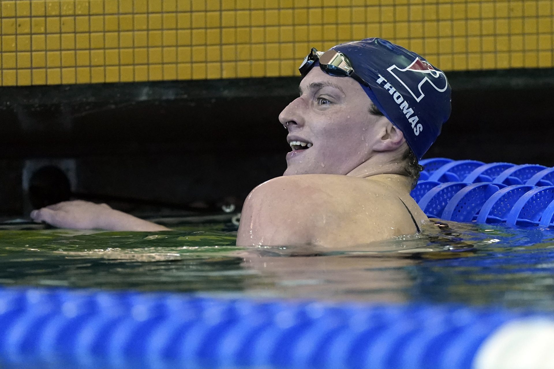 Pennsylvania's Lia Thomas smiles after winning a preliminary heat in the 500-yard freestyle at the NCAA women's swimming and diving championships Thursday, March 17, 2022, in at Georgia Tech in Atlanta.