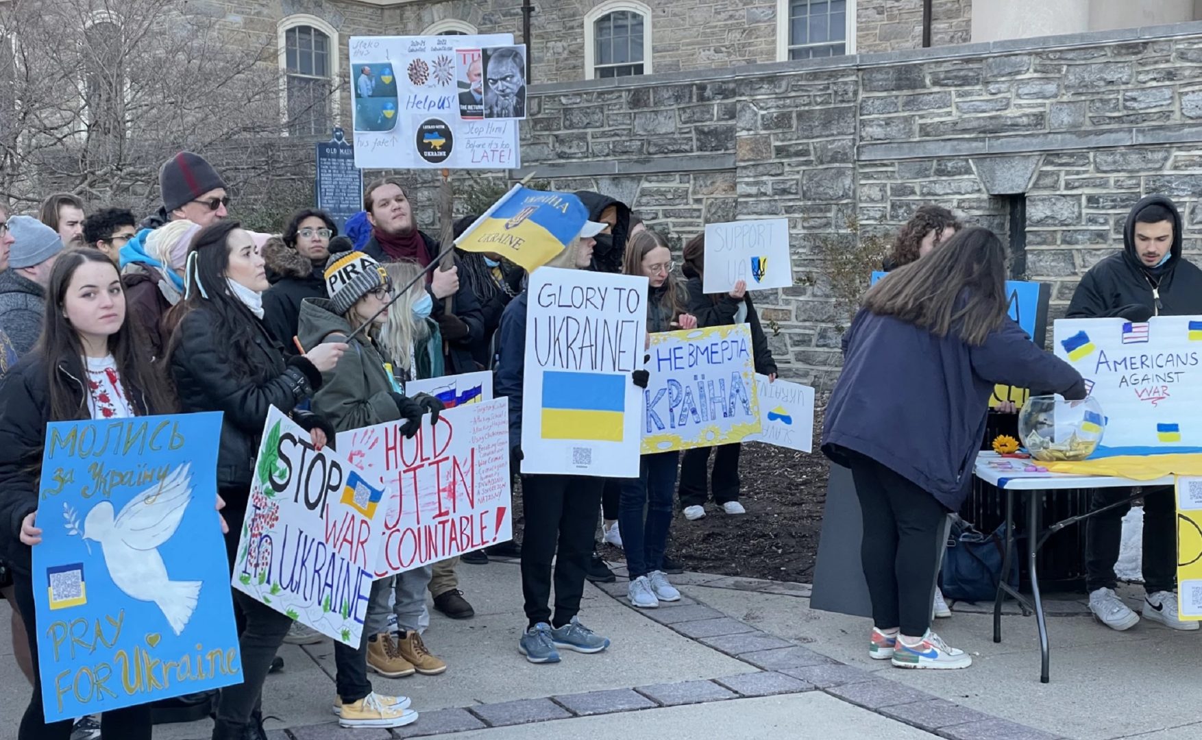 About 100 people gathered by the steps in front of Old Main at Penn State University to stand in solidarity with Ukraine. Chanting, singing and speeches all occurred during the rally on March 4, 2022.