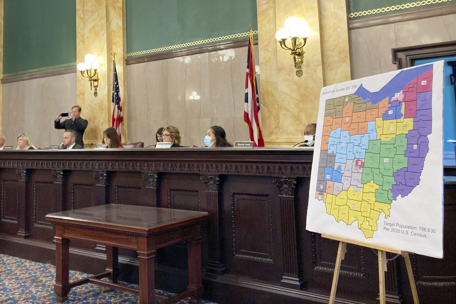 Members of the Ohio Senate Government Oversight Committee hear testimony on a new map of state congressional districts in this file photo from Nov. 16, 2021, at the Ohio Statehouse in Columbus, Ohio.