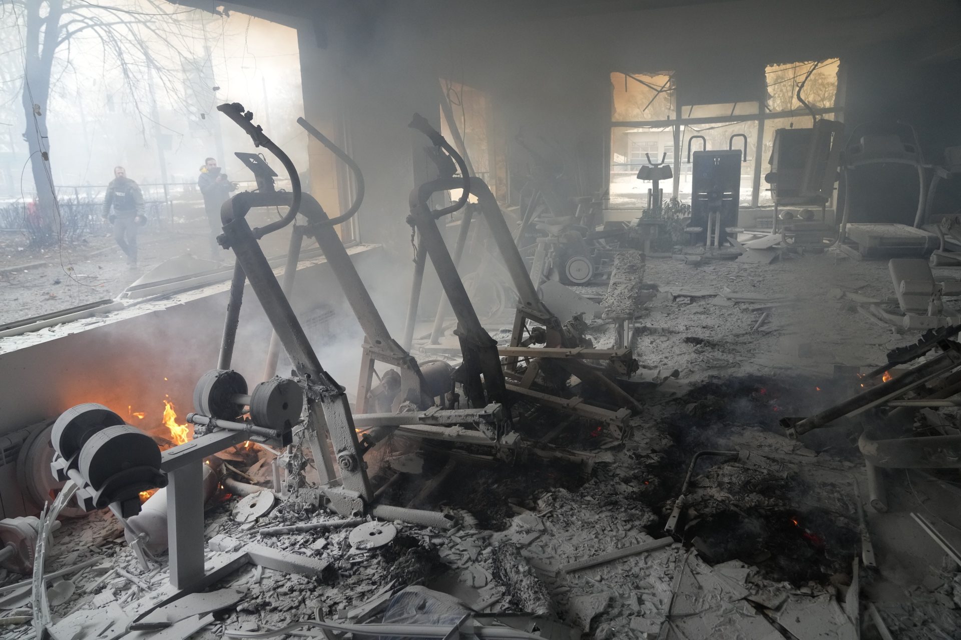 A view of smoke from inside a damaged gym following shelling in Kyiv, Ukraine, Wednesday, March 2, 2022. Russian forces have escalated their attacks on crowded cities in what Ukraine's leader called a blatant campaign of terror.