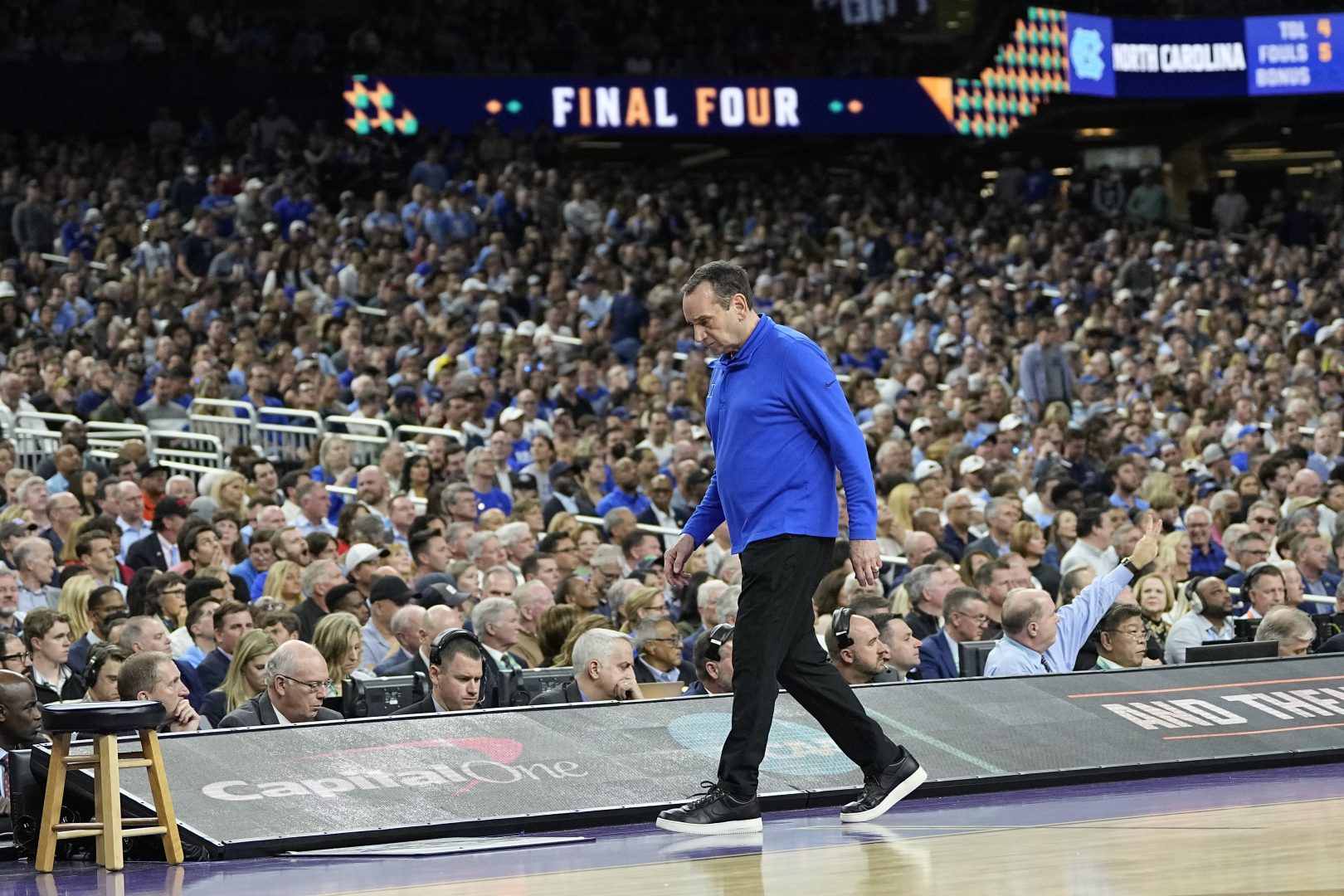 Duke head coach Mike Krzyzewski walks along the sideline during the first half of a college basketball game against North Carolina in the semifinal round of the Men's Final Four NCAA tournament, Saturday, April 2, 2022, in New Orleans. (AP Photo/David J. Phillip)