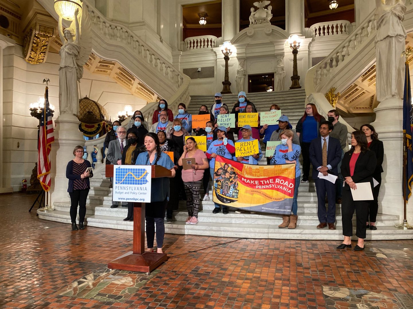 Patty Torres, organizing director for Latino advocacy group Make The Road PA, speaks at the capital. She's accompanied by member leaders of Make The Road, State Sen. Nikil Saval, and State Representatives Sara Innamorato and Elizabeth Fiedler.