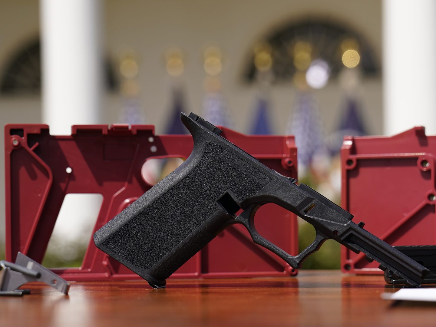 A 9mm pistol build kit with a commercial slide and barrel with a polymer frame is displayed before President Joe Biden and Deputy Attorney General Lisa Monaco speak in the Rose Garden of the White House in Washington, Monday, April 11, 2022, to announces a final version of its ghost gun rule, which comes with the White House and the Justice Department under growing pressure to crack down on gun deaths.