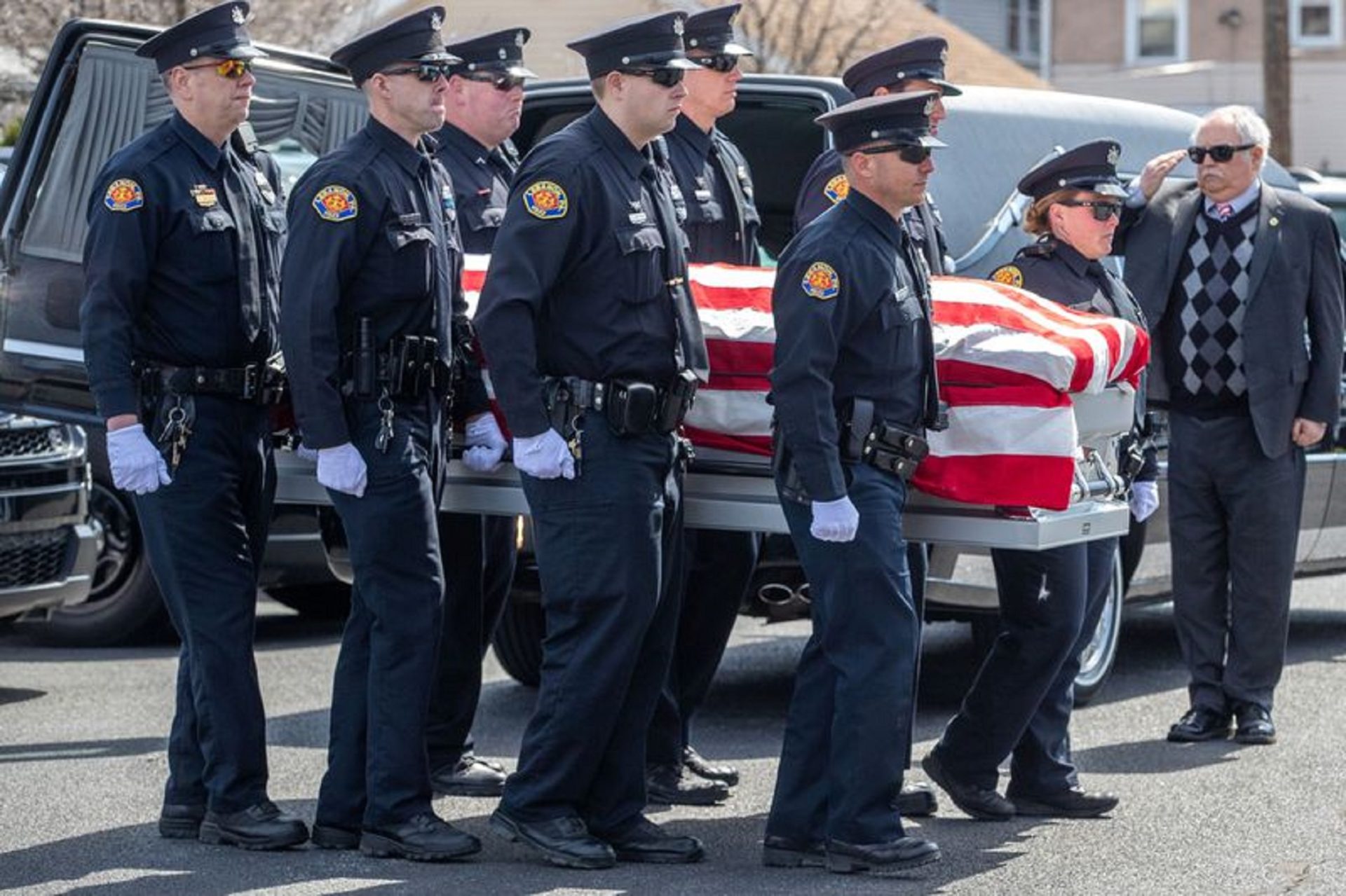 A Lebanon Police honor guard removes the casket of slain officer Lt. William Lebo, after an autopsy in Allentown, to the Christman’s Funeral Home in Lebanon, Pa,