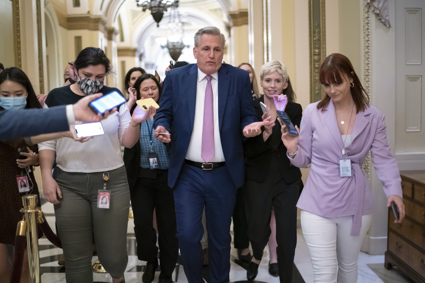House Minority Leader Kevin McCarthy, R-Calif., heads to his office surrounded by reporters after House investigators issued a subpoena to McCarthy and four other GOP lawmakers as part of their probe into the violent Jan. 6 insurrection, at the Capitol in Washington, Thursday, May 12, 2022. The House Select Committee on the January 6 Attack has been investigating McCarthy's conversations with then-President Donald Trump the day of the attack and meetings that the four other lawmakers had with the White House as Trump and his aides conspired how to overturn his defeat. (AP Photo/J. Scott Applewhite)